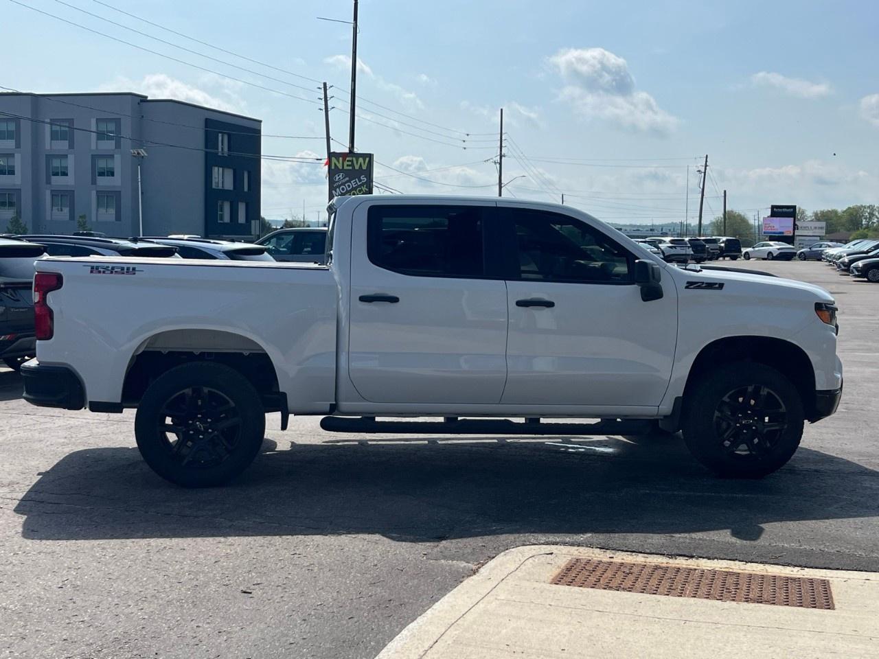 2024 Chevrolet Silverado 1500 Crew Cab Short Box 4-Wheel Drive Custom Trail Boss Photo