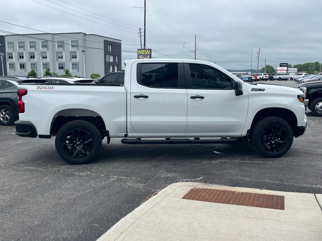 2024 Chevrolet Silverado 1500 Crew Cab Short Box 4-Wheel Drive Custom Trail Boss Photo