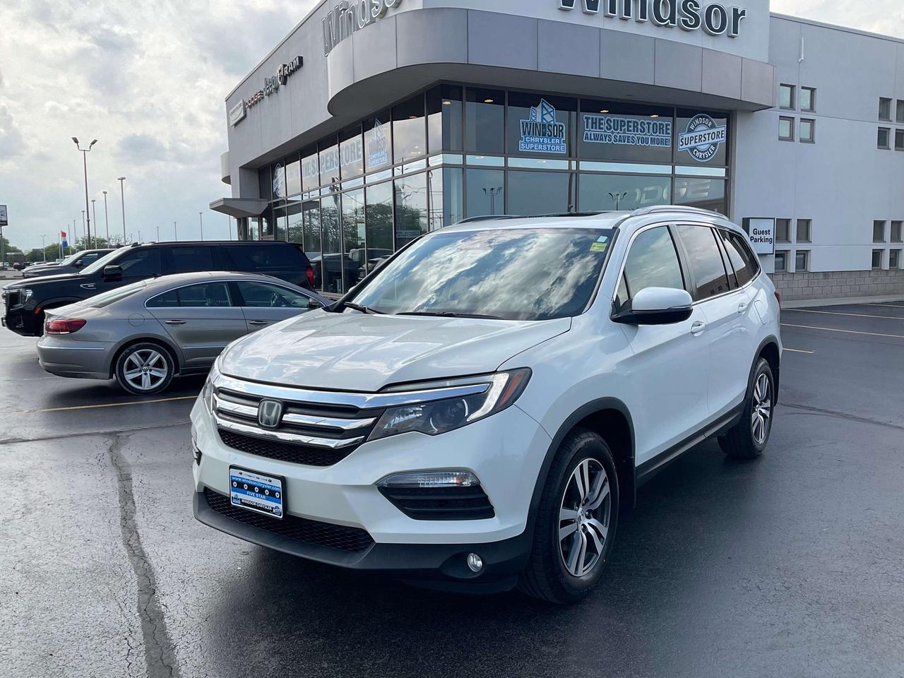 White Diamond Pearl 2017 Honda Pilot EX-L w/Navigation w/Navigation AWD 6-Speed Automatic 3.5L V6 SOHC i-VTEC 24V

**CARPROOF CERTIFIED**, AWD.

* PLEASE SEE OUR MAIN WEBSITE FOR MORE PICTURES AND CARFAX REPORTS * Buy in confidence at WINDSOR CHRYSLER with our 95-point safety inspection by our certified technicians. Searching for your upgrade has never been easier. You will immediately get the low market price based on our market research, which means no more wasted time shopping around for the best price, Its time to drive home the most car for your money today. OVER 100 Pre-Owned Vehicles in Stock! Our Finance Team will secure the Best Interest Rate from one of out 20 Auto Financing Lenders that can get you APPROVED! Financing Available For All Credit Types! Whether you have Great Credit, No Credit, Slow Credit, Bad Credit, Been Bankrupt, On Disability, Or on a Pension, we have options. Looking to just sell your vehicle? We buy all makes and models let us buy your vehicle. Proudly Serving Windsor, Essex, Leamington, Kingsville, Belle River, LaSalle, Amherstburg, Tecumseh, Lakeshore, Strathroy, Stratford, Leamington, Tilbury, Essex, St. Thomas, Waterloo, Wallaceburg, St. Clair Beach, Puce, Riverside, London, Chatham, Kitchener, Guelph, Goderich, Brantford, St. Catherines, Milton, Mississauga, Toronto, Hamilton, Oakville, Barrie, Scarborough, and the GTA.


Awards:
  * 2017 IIHS Top Safety Pick+ (When equipped with Honda Sensing and specific headlights)   * 2017 KBB.com Best Buy Awards   * 2017 KBB.com Brand Image Awards   * 2017 KBB.com 10 Best Certified Pre-Owned 3-Row SUVs Under $30,000   * 2017 KBB.com 12 Best Family Cars   * 2017 KBB.com 10 Most Awarded Brands
Kelley Blue Book Brand Image Awards are based on the Brand Watch(tm) study from Kelley Blue Book Market Intelligence. Award calculated among non-luxury shoppers.  For more information, visit www.kbb.com. Kelley Blue Book is a registered trademark of Kelley Blue Book Co., Inc.