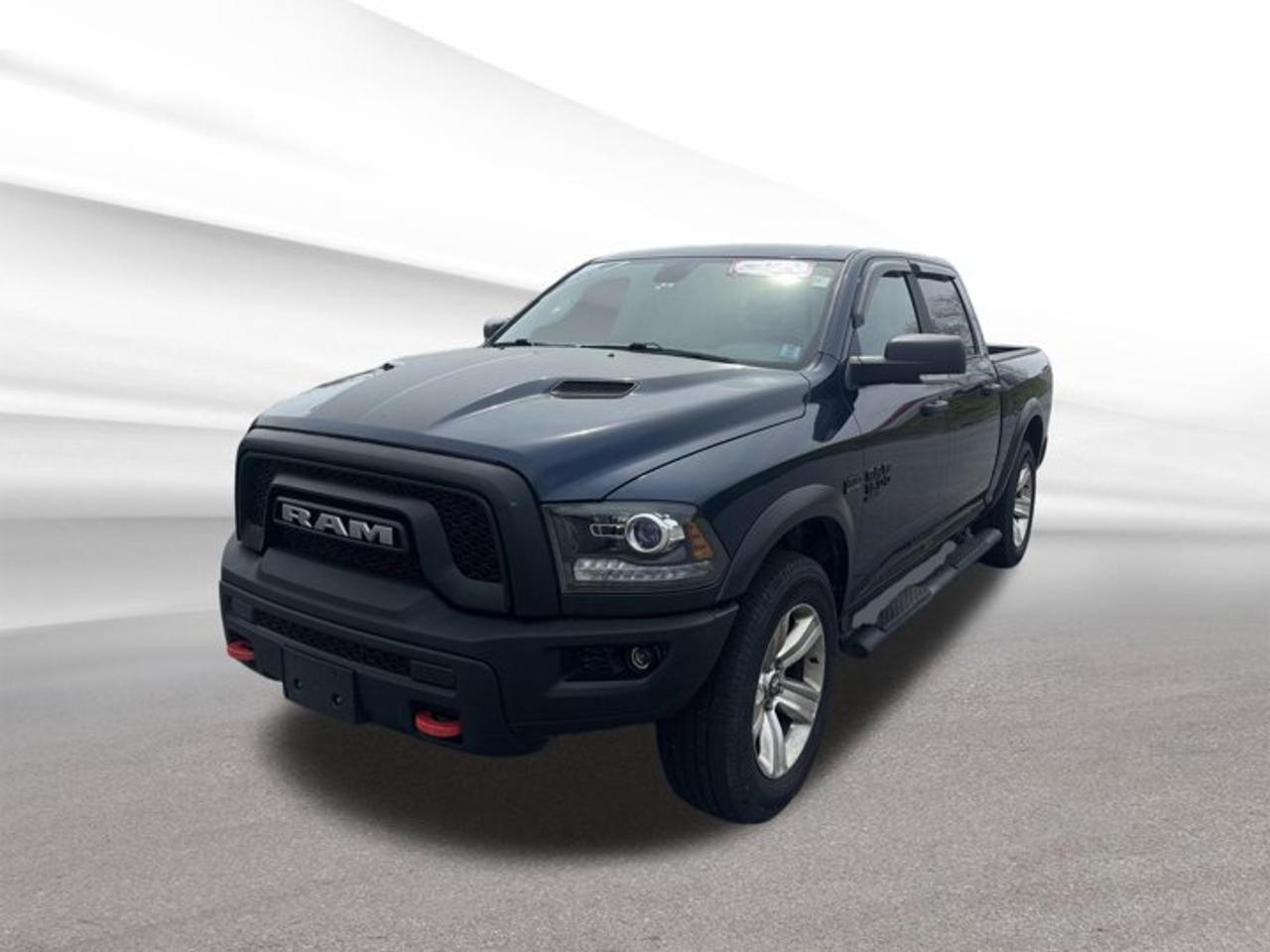 Meet the 2021 RAM 1500 Classic Warlock, a used full-size truck built for drivers who want V-8 power, bold style, and true 4x4 confidence. Offered by Steele Halifax Chrysler Dodge Jeep Ram FIAT in Halifax, this blue pickup pairs a black interior with four doors, automatic transmission, and 78,149 km for proven everyday capability.With its 5.7-litre HEMI V-8 gas engine and four-wheel drive, the 2021 RAM 1500 Classic Warlock is ready for work, weekend travel, and changing Maritime weather. This truck focuses on real-world strength and comfort, while the listed equipment adds welcome convenience for daily driving in every season.FEATURES OF THE 1500 Classic WarlockWarlock trim adds bold blacked-out stylingRaised stance supports confident truck presenceFour-door cab adds everyday practicalityBlue exterior gives this truck characterADVANCED SAFETY FEATURESFour-wheel drive adds traction in weatherRear window defroster improves winter visibilityAuto-dimming rearview mirror reduces night glareSpare tire offers added roadside reassurancePERFORMANCE AND EFFICIENCY5.7-litre HEMI V-8 delivers strong powerAutomatic transmission supports smooth daily drivingFour-wheel drive helps on rough roadsGasoline power suits work and travelCOMFORT AND CONVENIENCEHeated steering wheel adds cold-weather comfortPower outlet helps charge devices easilyFour doors improve passenger accessBlack interior gives a clean lookTECHNOLOGY AND CONNECTIVITYSatellite radio expands in-cabin entertainment choicesPower outlet supports mobile device chargingAuto-dimming mirror adds driving convenienceSimple controls support easy daily useTRUCK FEATURESStrong V-8 supports capable towing performancePickup bed handles gear and suppliesFour-wheel drive boosts jobsite confidenceSpare tire helps during unexpected stopsCARGO SPACEPickup box carries tools and weekend gearFour-door layout adds cabin storage flexibilitySpacious truck design supports active lifestylesRoom for passengers and cargo needsWHAT OTHER OWNERS LIKEHEMI V-8 power feels strongFour-wheel drive inspires year-round confidenceWarlock styling stands out on roadsComfortable ride suits daily truck useThe 2021 RAM 1500 Classic Warlock is a smart choice for drivers who need a truck that feels powerful, practical, and ready for Halifax roads. Its listed features, proven V-8 engine, automatic transmission, and 4x4 capability make it well suited for commuting, hauling gear, and getting through winter with greater confidence.This 2021 RAM 1500 Classic Warlocks VIN is: 1C6RR7LT6MS557265.We invite you to book a viewing and test drive at your earliest convenience