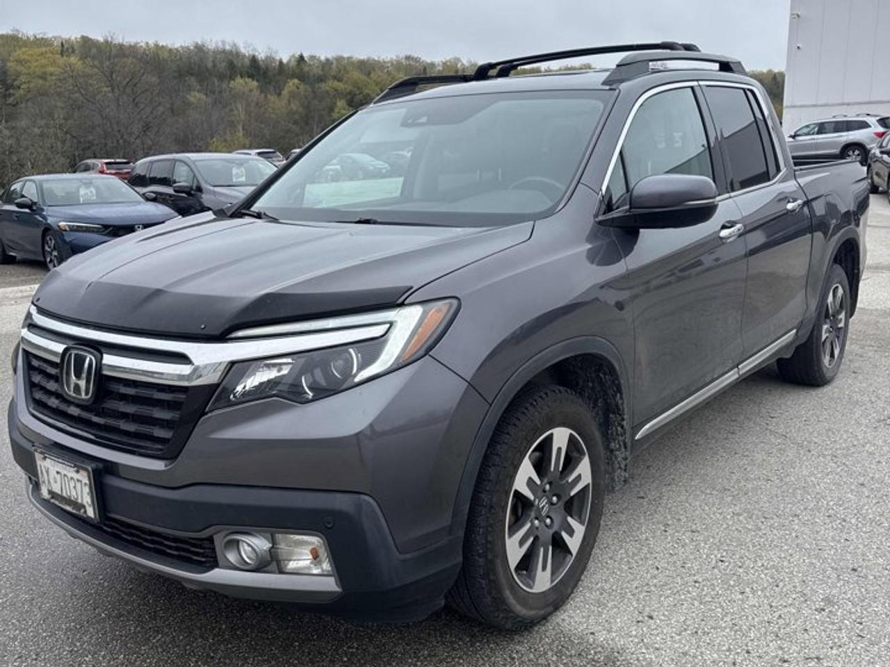 Look at this certified 2019 Honda Ridgeline Touring AWD | Nav | Leather | Sunroof | Adaptive Cruise | Heated Seats & Steering | Bluetooth & More. Its Automatic transmission and 3.5 L engine will keep you going. This Honda Ridgeline has the following options: Sunroof, Navigation System, Leather, Heated Steering Wheel, Air Conditioning, Adaptive Cruise, Bluetooth, Heated Seats, Tilt Steering Wheel, and Steering Radio Controls. Stop by and visit us at Mark Wilsons Better Used Cars, 5055 Whitelaw Road, Guelph, ON N1H 6J4.MASSIVE SELECTION: 500+ vehicles in ONE LOCATION, all Live Market Priced for the best value!STRAIGHTFORWARD & TRANSPARENT PRICING: Our Advertised Price INCLUDES:Safety Certification! (No separate certification fee upcharge).FREE Carfax History Report!NO upcharge for paying cash!CONFIDENCE & PEACE OF MIND: 30-Day/3,000 km Warranty INCLUDED! Plus a 5-Day Exchange Privilege!*EASY FINANCING: Better-than-bank rates, $0 Down, and 3 Months No Payments available OAC. BAD CREDIT APPROVED HERE!WE BUY CARS: Get Top Dollar for your trade, or sell us your vehicle for CASH even if you dont buy ours!www.shopwilsons.comAn Honest, Transparent Buying Experience. Trusted in business since 1961!(Cash Prices Exclude HST and Licensing Fees only.)