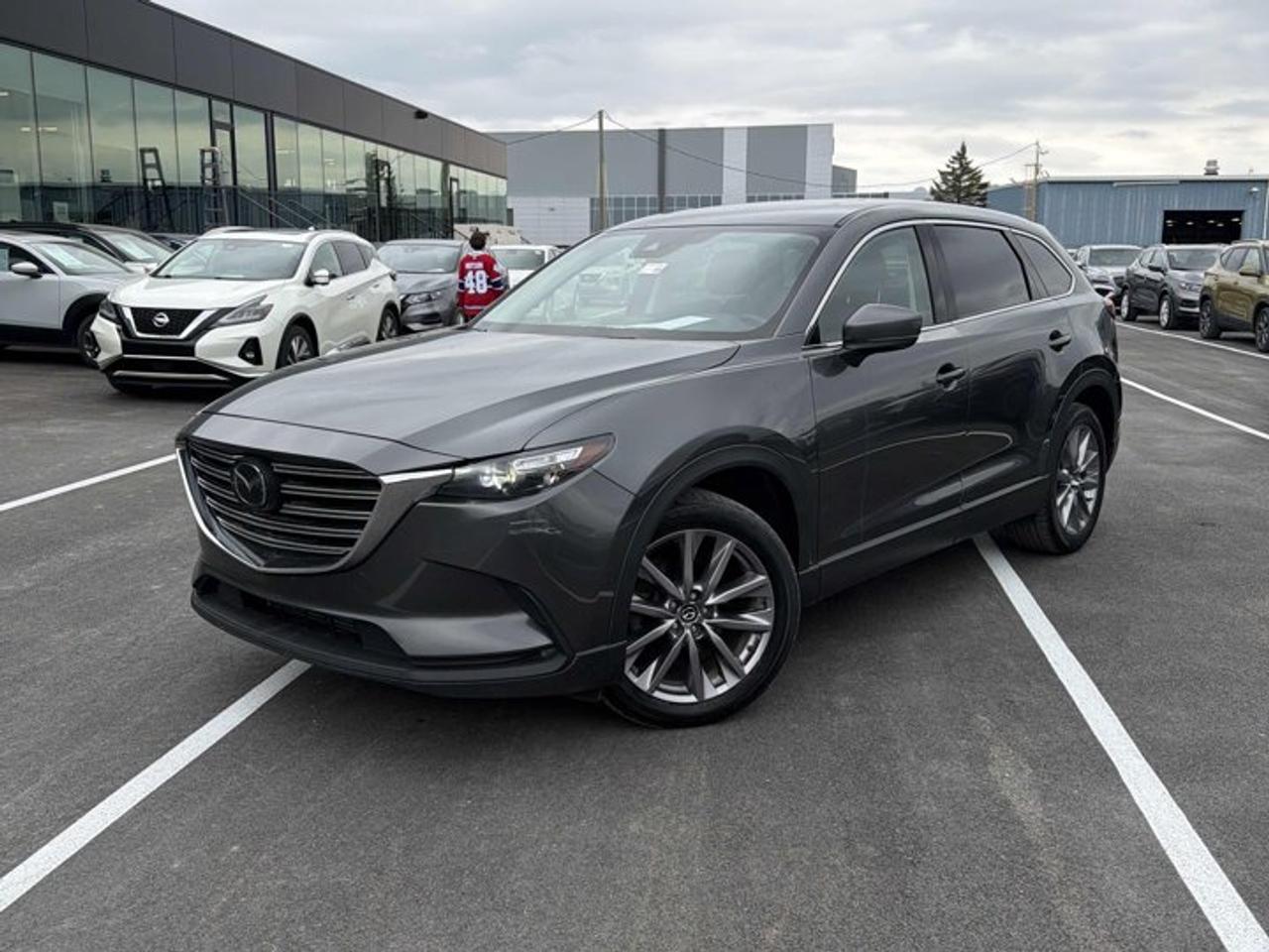 Check out this certified 2023 Mazda CX-9 GS-L AWD | Leather | Sunroof | Captain Seats | Adaptive Cruise | Heated Wheel + Seats | and More !. Its Automatic transmission and 2.5 L engine will keep you going. This Mazda CX-9 has the following options: Sunroof, Leather, Heated Steering Wheel, Air Conditioning, Adaptive Cruise, Heated Seats, Tilt Steering Wheel, Steering Radio Controls, Power Windows, and Power Locks. See it for yourself at Mark Wilsons Better Used Cars, 5055 Whitelaw Road, Guelph, ON N1H 6J4.MASSIVE SELECTION: 500+ vehicles in ONE LOCATION, all Live Market Priced for the best value!STRAIGHTFORWARD & TRANSPARENT PRICING: Our Advertised Price INCLUDES:Safety Certification! (No separate certification fee upcharge).FREE Carfax History Report!NO upcharge for paying cash!CONFIDENCE & PEACE OF MIND: 30-Day/3,000 km Warranty INCLUDED! Plus a 5-Day Exchange Privilege!*EASY FINANCING: Better-than-bank rates, $0 Down, and 3 Months No Payments available OAC. BAD CREDIT APPROVED HERE!WE BUY CARS: Get Top Dollar for your trade, or sell us your vehicle for CASH even if you dont buy ours!www.shopwilsons.comAn Honest, Transparent Buying Experience. Trusted in business since 1961!(Cash Prices Exclude HST and Licensing Fees only.)