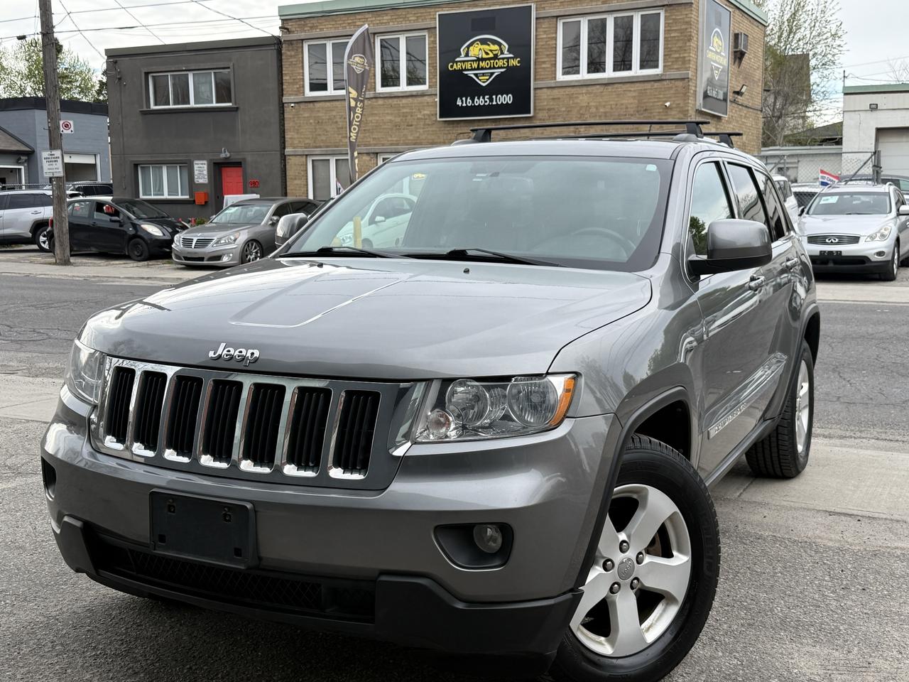 2013 Jeep Grand Cherokee 4WD 4Dr Laredo - Photo #1