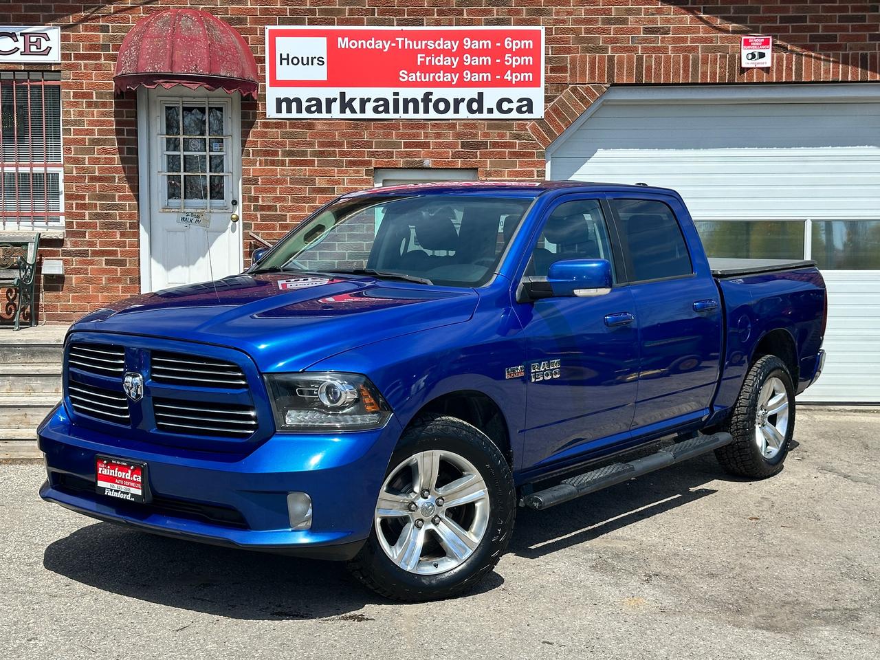 <p>Super-Clean Local RAM 1500 trade-in from Bowmanville, ON! This Sport 4x4 CrewCab model looks great in its Blue paint and factory alloy wheels, with nice options and styling inside and out! The exterior features keyless entry with a remote start, automatic headlights, foglights, a sliding rear window, colour-matched bumpers and mirrors with integrated mirror signals, tinted privacy glass, side steps, a trailer hitch, sporty dual exhaust, a spray-in bedliner, and soft tonneau cover, gorgeous factory alloy wheels with <strong>NEW</strong> All-Season Tires freshly installed, a powerful 5.7L HEMI V8 Engine and Automatic transmission drive the 4x4 system! The interior is clean and comfortable with bolstered cloth seating for 5 occupants, power drivers seat adjustment with lumbar control, all-weather floor mats, power door locks, windows and mirrors, spacious rear seating, a leather wrapped steering wheel with Audio and Cruise controls, push button start, an easy to read and use gauge cluster, turn-knob gear selection, and electronic 4x4 selection buttons, a large central touch screen AM/FM/XM Satellite Radio with Bluetooth, Backup Camera and MP3 capabilities, A/C climate control with front and rear window defrost settings, TOW/HAUL mode, universal garage door openers, and more!</p><p>&nbsp;</p><p>Carfax Claims Free, Sharp-Looking Local Truck with Plenty of Power!</p><p>&nbsp;</p><p>Call (905) 623-2906</p><p>&nbsp;</p><p>Text Ryan: (905) 429-9680 or email: ryan@markrainford.ca</p><p>&nbsp;</p><p>Text Mark: (905) 431-0966 or email: mark@markrainford.ca</p>