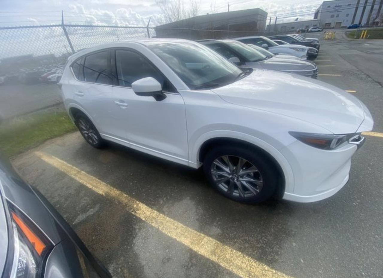 Come see this certified 2025 Mazda CX-5 GT AWD | Leather | Sunroof | Nav | HUD | Cooled + Heated Seats | Heated Wheel | Bose | and More !. Its Automatic transmission and 2.5 L engine will keep you going. This Mazda CX-5 features the following options: Sunroof, Navigation System, Leather, Heated Steering Wheel, Heads Up Display, Bose Speaker System, Air Conditioning, Air Conditioned Seats, Adaptive Cruise, and Heated Seats. Test drive this vehicle at Mark Wilsons Better Used Cars, 5055 Whitelaw Road, Guelph, ON N1H 6J4.MASSIVE SELECTION: 500+ vehicles in ONE LOCATION, all Live Market Priced for the best value!STRAIGHTFORWARD & TRANSPARENT PRICING: Our Advertised Price INCLUDES:Safety Certification! (No separate certification fee upcharge).FREE Carfax History Report!NO upcharge for paying cash!CONFIDENCE & PEACE OF MIND: 30-Day/3,000 km Warranty INCLUDED! Plus a 5-Day Exchange Privilege!*EASY FINANCING: Better-than-bank rates, $0 Down, and 3 Months No Payments available OAC. BAD CREDIT APPROVED HERE!WE BUY CARS: Get Top Dollar for your trade, or sell us your vehicle for CASH even if you dont buy ours!www.shopwilsons.comAn Honest, Transparent Buying Experience. Trusted in business since 1961!(Cash Prices Exclude HST and Licensing Fees only.)