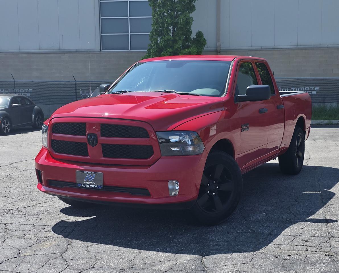<p dir=ltr>JUST ARRIVED!!</p><p dir=ltr>2018 Dodge RAM 1500 Express</p><p dir=ltr>GREAT WORK TRUCK!!</p><p dir=ltr>The 2018 RAM 1500 Express V6 is a versatile half-ton pickup truck that balances work-ready performance with a sleek, monochromatic look. Powered by the highly reliable 3.6L Pentastar V6 engine paired with a smooth 8-speed TorqueFlite automatic transmission, this trim is aimed at buyers who want the styling of a sport truck without the higher fuel costs and price tag of a V8.</p><p dir=ltr><strong>Key Specifications & Performance:</strong></p><p dir=ltr><strong>Engine:</strong> 3.6-litre Pentastar V6 (Flex-Fuel capable).</p><p dir=ltr><strong>Power:</strong> 305 horsepower @ 6,400 rpm and 269 lb-ft of torque @ 4,175 rpm.</p><p dir=ltr><strong>Transmission:</strong> TorqueFlite 8-speed automatic with electronic rotary dial shifter.</p><p dir=ltr><strong>Drivetrain:</strong> Available in both Rear-Wheel Drive (2WD) and Part-Time Four-Wheel Drive (4WD).</p><p dir=ltr><strong>Fuel Economy (EPA):</strong></p><p dir=ltr><strong>2WD: </strong>17 city / 25 highway MPG (13.9 / 9.6 L/100km).</p><p dir=ltr><strong>4WD:</strong> 16 city / 23 highway MPG (14.8 / 10.3 L/100km).</p><p dir=ltr><strong>Capacities:</strong> Maximum towing capacity of up to 7,600 lbs (depending on cab configuration and axle ratio) and a maximum payload capacity of roughly 1,880 lbs.</p><p dir=ltr><strong>The Express Packaging:</strong></p><p dir=ltr>The Express trim shares its mechanical bones and basic interior with the entry-level Tradesman but replaces the utilitarian black plastic bumpers with a customized look.</p><p dir=ltr><strong>Exterior Styling:</strong> Body-colour front fascia, body-colour rear bumper, and a body-colour grille surround with black honeycomb inserts.</p><p dir=ltr><strong>Wheels:</strong> Standard 20-inch aluminum wheels (compared to the 17-inch steel wheels on the Tradesman).</p><p dir=ltr><strong>Cabin Basics:</strong> Standard carpeting, heavy-duty cloth front bench seat (6-passenger capacity via a flip-up centre console seat), power windows, power locks, and cruise control.</p><p dir=ltr><strong>Technology:</strong> Base models feature a smaller 5-inch Uconnect touchscreen with a backup camera, Bluetooth, hands-free calling, and auxiliary inputs</p><p dir=ltr style=line-height: 1.2; margin-top: 12pt; margin-bottom: 12pt;>&nbsp;</p><p dir=ltr style=line-height: 1.2; margin-top: 12pt; margin-bottom: 12pt;><span style=font-size: 11pt; font-family: Roboto,sans-serif; color: #000000; background-color: transparent; font-weight: 400; font-style: italic; font-variant: normal; text-decoration: none; vertical-align: baseline; white-space: pre-wrap;>**VEHICLE BEING SOLD ON CONSIGNMENT** </span></p><p dir=ltr style=line-height: 1.2; margin-top: 12pt; margin-bottom: 12pt;><span style=font-size: 11pt; font-family: Roboto,sans-serif; color: #000000; background-color: transparent; font-weight: 400; font-style: italic; font-variant: normal; text-decoration: none; vertical-align: baseline; white-space: pre-wrap;>FINANCING AND LEASING AVAILABLE ON ALL CERTIFIED VEHICLES.</span></p><p dir=ltr style=line-height: 1.2; margin-top: 12pt; margin-bottom: 12pt;><span style=font-size: 11pt; font-family: Roboto,sans-serif; color: #000000; background-color: transparent; font-weight: 400; font-style: italic; font-variant: normal; text-decoration: none; vertical-align: baseline; white-space: pre-wrap;>HST and Licensing Fees are to be charged on all vehicles.&nbsp;</span></p><p dir=ltr style=line-height: 1.2; margin-top: 12pt; margin-bottom: 12pt;><span style=font-size: 11pt; font-family: Roboto,sans-serif; color: #000000; background-color: transparent; font-weight: 400; font-style: italic; font-variant: normal; text-decoration: none; vertical-align: baseline; white-space: pre-wrap;>All CERTIFIED vehicles come with a 36-day Safety Guarantee.</span></p><p dir=ltr style=line-height: 1.2; margin-top: 12pt; margin-bottom: 12pt;><span style=font-size: 11pt; font-family: Roboto,sans-serif; color: #000000; background-color: transparent; font-weight: 400; font-style: italic; font-variant: normal; text-decoration: none; vertical-align: baseline; white-space: pre-wrap;>ALL CERTIFIED VEHICLES COME WITH A BRONZE GLOBAL WARRANTY (3 MONTH / 3,000 KM / $1,000 PER CLAIM)</span></p><p dir=ltr style=line-height: 1.2; margin-top: 12pt; margin-bottom: 12pt;><span style=font-size: 11pt; font-family: Roboto,sans-serif; color: #000000; background-color: transparent; font-weight: 400; font-style: italic; font-variant: normal; text-decoration: none; vertical-align: baseline; white-space: pre-wrap;>EXTENDED GLOBAL WARRANTY OPTIONS AVAILABLE ON ALL CERTIFIED VEHICLES.</span></p><p dir=ltr style=line-height: 1.2; margin-top: 12pt; margin-bottom: 12pt;><span style=font-size: 11pt; font-family: Roboto,sans-serif; color: #000000; background-color: transparent; font-weight: 400; font-style: italic; font-variant: normal; text-decoration: none; vertical-align: baseline; white-space: pre-wrap;>Auto View is located at 590 South Service Road Stoney Creek, only minutes off the QEW Exit 83 Fruitland Road!</span></p><p dir=ltr style=line-height: 1.2; margin-top: 12pt; margin-bottom: 12pt;><span style=font-size: 11pt; font-family: Roboto,sans-serif; color: #000000; background-color: transparent; font-weight: 400; font-style: italic; font-variant: normal; text-decoration: none; vertical-align: baseline; white-space: pre-wrap;>Contact us VIA email, call, or text!</span></p><p dir=ltr style=line-height: 1.2; margin-top: 12pt; margin-bottom: 12pt;><span style=font-size: 11pt; font-family: Roboto,sans-serif; color: #000000; background-color: transparent; font-weight: 400; font-style: italic; font-variant: normal; text-decoration: none; vertical-align: baseline; white-space: pre-wrap;>sales@autoview.ca</span></p><p style=line-height: 1.2;><span id=docs-internal-guid-dc6619b1-7fff-14fb-1847-6df547af7f68></span></p><p dir=ltr style=line-height: 1.2; margin-top: 12pt; margin-bottom: 12pt;><span style=font-size: 11pt; font-family: Roboto,sans-serif; color: #000000; background-color: transparent; font-weight: 400; font-style: italic; font-variant: normal; text-decoration: none; vertical-align: baseline; white-space: pre-wrap;>905-379-4206</span></p>