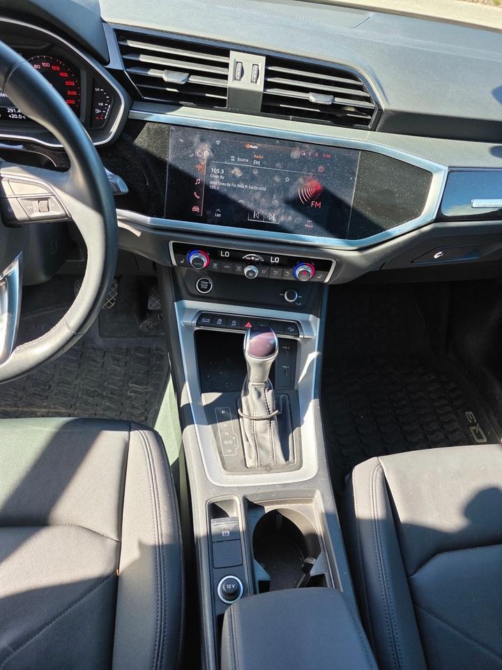 <p> 2.0L Turbocharged 4-Cylinder Engine<br data-start=65 data-end=68> 8-Speed Automatic Transmission with Tiptronic<br data-start=115 data-end=118> quattro All-Wheel Drive System<br data-start=150 data-end=153> Komfort Trim Package<br data-start=175 data-end=178> 18 Alloy Wheels<br data-start=196 data-end=199> LED Headlights & LED Daytime Running Lights<br data-start=244 data-end=247> Power Tailgate<br data-start=263 data-end=266> Panoramic Sunroof<br data-start=285 data-end=288> Heated Power Side Mirrors with Integrated Turn Signals<br data-start=344 data-end=347> Rain-Sensing Windshield Wipers<br data-start=379 data-end=382> Keyless Entry with Push Button Start<br data-start=420 data-end=423> Remote Start Capability via Audi Connect<br data-start=465 data-end=468> Leather Seating Surfaces<br data-start=494 data-end=497> Heated Front Seats<br data-start=517 data-end=520> 8-Way Power Front Seats with Driver Memory<br data-start=564 data-end=567> Leather-Wrapped Multifunction Steering Wheel<br data-start=613 data-end=616> Tri-Zone Automatic Climate Control<br data-start=652 data-end=655> Audi Virtual Cockpit Digital Instrument Cluster<br data-start=704 data-end=707> 10.1 Touchscreen Infotainment System<br data-start=746 data-end=749> Apple CarPlay & Android Auto<br data-start=779 data-end=782> Bluetooth Hands-Free Calling & Audio Streaming<br data-start=830 data-end=833> Audi Smartphone Interface<br data-start=860 data-end=863> SiriusXM Satellite Radio<br data-start=889 data-end=892> USB-C Charging Ports<br data-start=914 data-end=917> Wireless Charging Pad<br data-start=940 data-end=943> Rear View Camera<br data-start=961 data-end=964> Front & Rear Parking Sensors<br data-start=994 data-end=997> Audi Pre Sense Front<br data-start=1019 data-end=1022> Lane Departure Warning<br data-start=1046 data-end=1049> Blind Spot Monitoring<br data-start=1072 data-end=1075> Adaptive Cruise Control (if equipped)<br data-start=1114 data-end=1117> Drive Select Modes<br data-start=1137 data-end=1140> Power Folding Rear Seats<br data-start=1166 data-end=1169> LED Interior Ambient Lighting<br data-start=1200 data-end=1203> Roof Rails<br data-start=1215 data-end=1218> Rear Privacy Glass<br data-start=1238 data-end=1241> Electronic Parking Brake with Auto Hold<br data-start=1282 data-end=1285> Advanced Airbag Safety System<br data-start=1316 data-end=1319> Stability & Traction Control</p><p>This <strong data-start=1380 data-end=1412>2022 Audi Q3 Komfort quattro</strong> in black delivers premium comfort, sporty performance, and advanced German engineering in a compact luxury SUV. Powered by a responsive turbocharged engine and Audis renowned quattro all-wheel drive system, it offers confident handling and year-round capability. The refined interior features leather seating, panoramic sunroof, Audi Virtual Cockpit, and seamless smartphone integration, while advanced safety and driver-assist technologies provide added confidence on every drive. Stylish, practical, and upscale, this Q3 Komfort is an exceptional luxury SUV for daily commuting or weekend travel.</p>