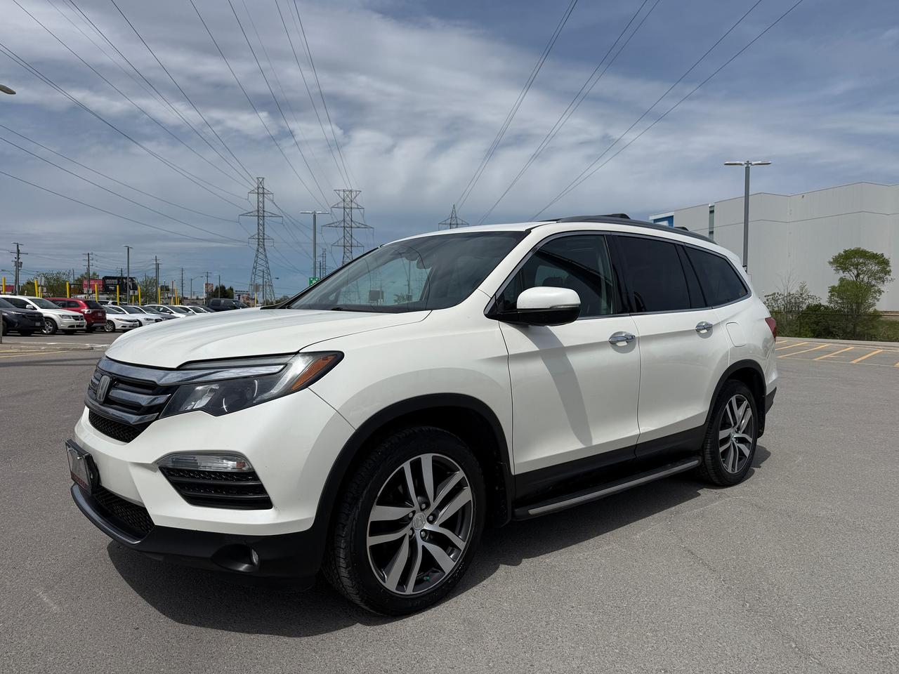 2017 Honda Pilot Touring*CAPTAIN CHAIRS*DVD*NAVI*LOADED* Photo