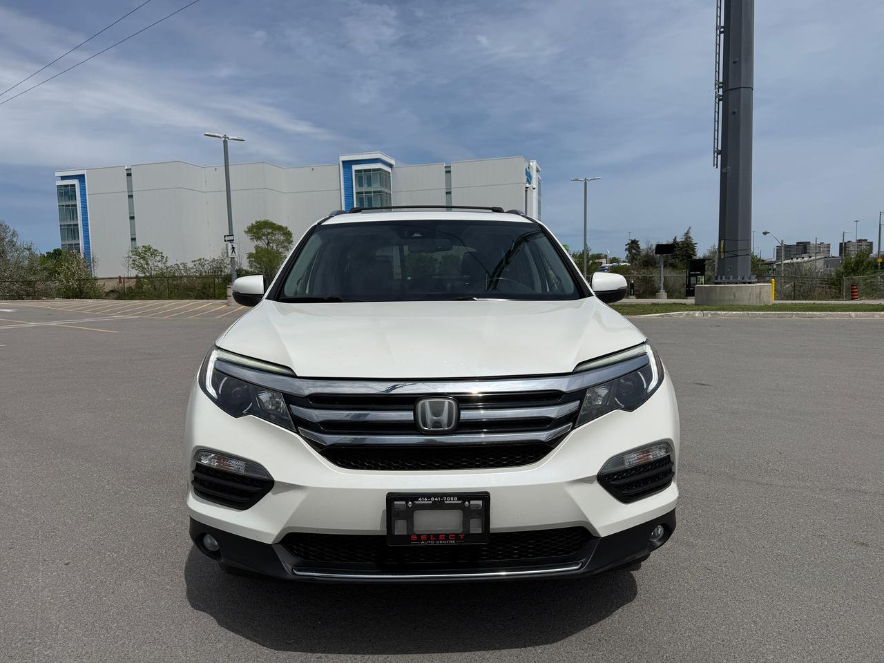 2017 Honda Pilot Touring*CAPTAIN CHAIRS*DVD*NAVI*LOADED* Photo2