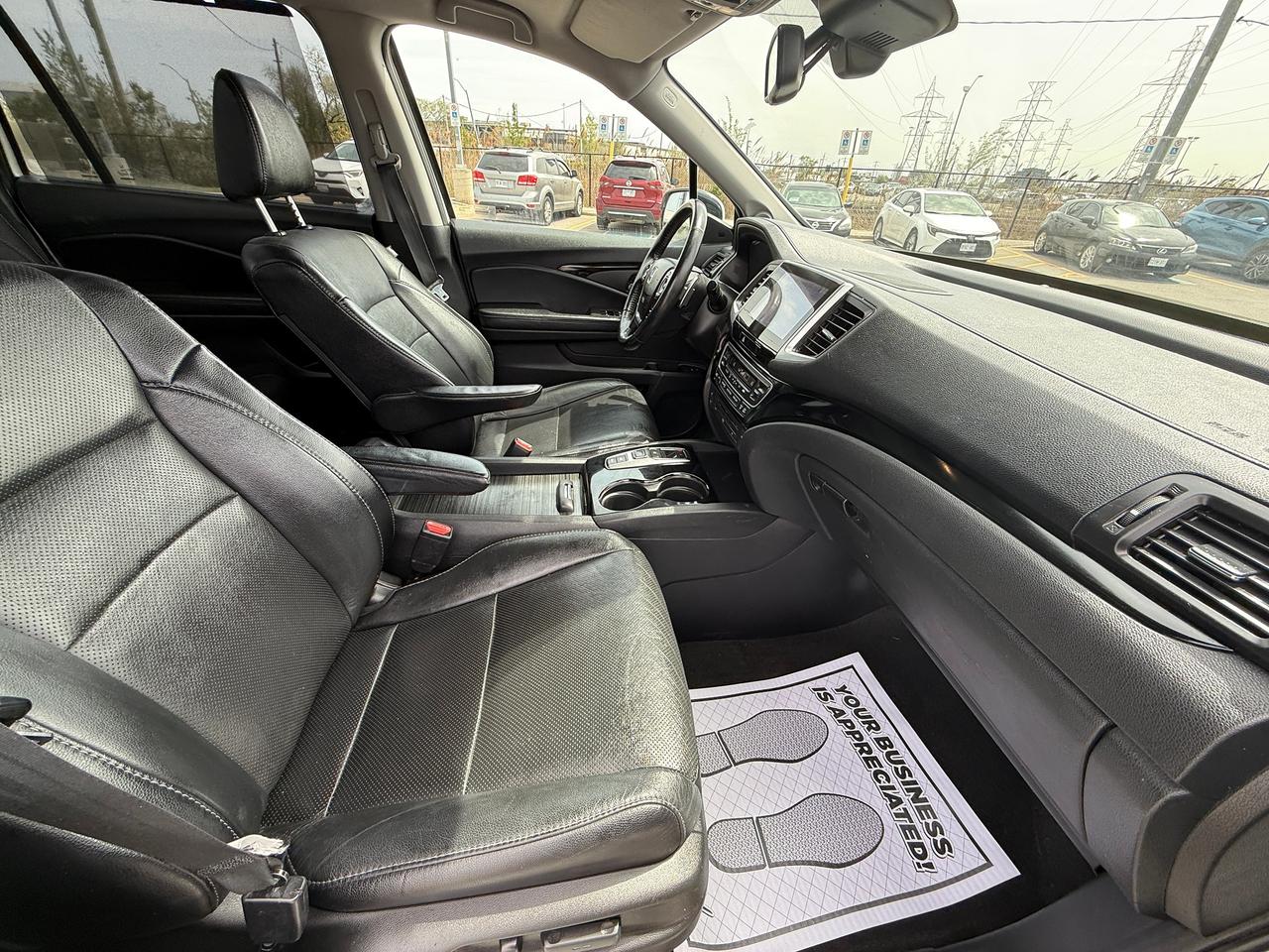2017 Honda Pilot Touring*CAPTAIN CHAIRS*DVD*NAVI*LOADED* Photo