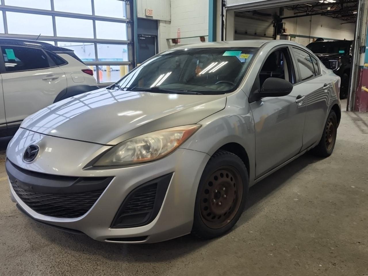 ** ** SPECIAL LIMITED TIME OFFER ** ** PURCHASE ANY VEHICLE THIS WEEK AND RECEIVE 4 BRAND-NEW ALL-SEASON TIRES AT NO ADDITIONAL COST!!! DONT MISS THIS EXCLUSIVE CHANCE TO UPGRADE YOUR RIDE AND STAY PREPARED FOR ANY WEATHER!!!       EXCITING NEWS FROM FIRST CHOICE MOTORS! Our brand-new online showroom is now open to the public, bringing the ultimate car shopping experience right to your fingertips! Enjoy a 100% online car shopping experience, with over 500 certified vehicles in stock, comprehensive protection plans, and thousands of new auto parts & accessories available! Plus, for a limited time, were offering FREE deliveries across Ontario on all vehicle purchases! Dont miss outvisit Shop.fcmotors.ca to find and upgrade your perfect vehicle today!      Welcome to First Choice Motors, the largest car dealership in Toronto of pre-owned cars, SUVs, and vans priced between $5000-$15,000. With an impressive inventory of over 300 vehicles in stock, we are dedicated to providing our customers with a vast selection of affordable and reliable options.       Were thrilled to offer a used 2011 Mazda MAZDA3 GX, grey color with 225,000km (STK#9904) This vehicle was $6490 NOW ON SALE FOR $5990. It is equipped with the following features:   - Automatic Transmission   - Alloy wheels   - Power windows   - Power locks   - Power mirrors   - Air Conditioning      At First Choice Motors, we believe in providing quality vehicles that our customers can depend on. All our vehicles come with a 36-day guarantee on all safety related items. We also offer additional warranty options up to 5 years for our customers who want extra peace of mind.      Furthermore, all our vehicles are sold fully certified with brand new brakes rotors and pads, a fresh oil change, and brand new set of all-season tires installed & balanced. You can be confident that this car is in excellent condition and ready to hit the road.      At First Choice Motors, we believe that everyone deserves a chance to own a reliable and affordable vehicle. Thats why we offer financing options with low interest rates starting at 7.9% O.A.C. Were proud to approve all customers, including those with bad credit, no credit, students, and even 9 socials. Our finance team is dedicated to finding the best financing option for you and making the car buying process as smooth and stress-free as possible.      Our dealership is open 7 days a week to provide you with the best customer service possible. We carry the largest selection of used vehicles for sale under $9990 in all of Ontario. We stock over 300 cars, mostly Hyundai, Chevrolet, Mazda, Honda, Volkswagen, Toyota, Ford, Dodge, Kia, Mitsubishi, Acura, Lexus, and more. With our ongoing sale, you can find your dream car at a price you can afford. Come visit us today and experience why we are the best choice for your next used car purchase!      All prices include $22.00 OMVIC Fee.  Excludes, license plates, ownership registration and ONTARIO HST (13%)   *No Credit Card payments can be accepted for Vehicle Purchases*    *No Credit Card payments can be accepted for Vehicle Purchases*