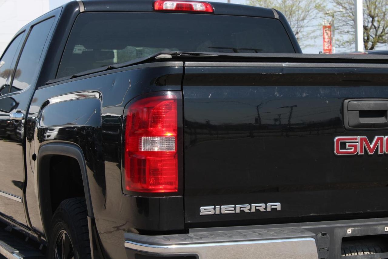 2014 GMC Sierra K1500 SLT  SiriusXM BedCover SideSteps BkpCam Photo