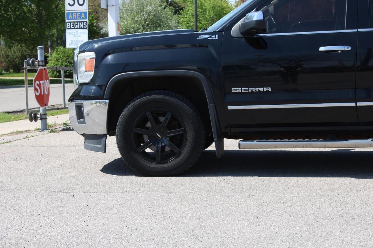 2014 GMC Sierra K1500 SLT  SiriusXM BedCover SideSteps BkpCam Photo
