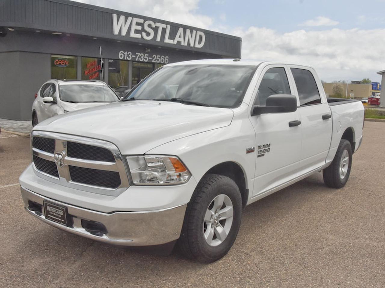 <p>Prepare to conquer any task or adventure with this robust 2023 RAM 1500 Classic SLT 4x4 Crew Cab, now available at Westland Auto Sales. Dressed in a timeless White exterior and featuring a comfortable Gray interior, this RAM 1500 Classic is built for capability and comfort. With just 76,267 kilometers on the odometer, its ready to deliver reliable performance for years to come.</p><p>Under the hood, youll find the legendary 5.7L HEMI V8 engine, providing impressive power and a satisfying rumble. Coupled with a smooth automatic transmission and a go-anywhere 4-wheel drive system, this truck is more than capable of handling demanding jobs and weekend getaways alike. The spacious Crew Cab ensures ample room for your passengers, while the 57 box offers versatility for hauling everything from work equipment to recreational gear.</p><p>This RAM 1500 Classic SLT is a true workhorse, designed with both practicality and driver convenience in mind. Experience the legendary RAM toughness and explore all the possibilities this exceptional truck offers.</p><p>Here are 5 features that truly make this RAM 1500 Classic stand out:</p><ul><li><strong>5.7L HEMI V8 Engine:</strong> Unleash the legendary power and confident performance of this iconic engine, ready to tackle any challenge.</li><li><strong>4x4 Capability:</strong> Conquer challenging terrain and inclement weather with the confidence and traction of a robust 4-wheel drive system.</li><li><strong>Crew Cab Comfort:</strong> Enjoy generous interior space for up to six passengers, ensuring everyone travels in comfort on every journey.</li><li><strong>Versatile 57 Box:</strong> Haul your tools, gear, or weekend toys with ease, providing the practical cargo space you need.</li><li><strong>Automatic Transmission:</strong> Experience smooth and effortless shifting, making every drive, whether on the highway or navigating city streets, a pleasure.</li></ul><p><strong><em>Powered by AutoIntelligence&trade;</em></strong></p><p>Vehicle information has been generated using artificial intelligence and is provided for informational purposes only. While efforts are made to ensure accuracy, please confirm all details directly with the dealer.</p>