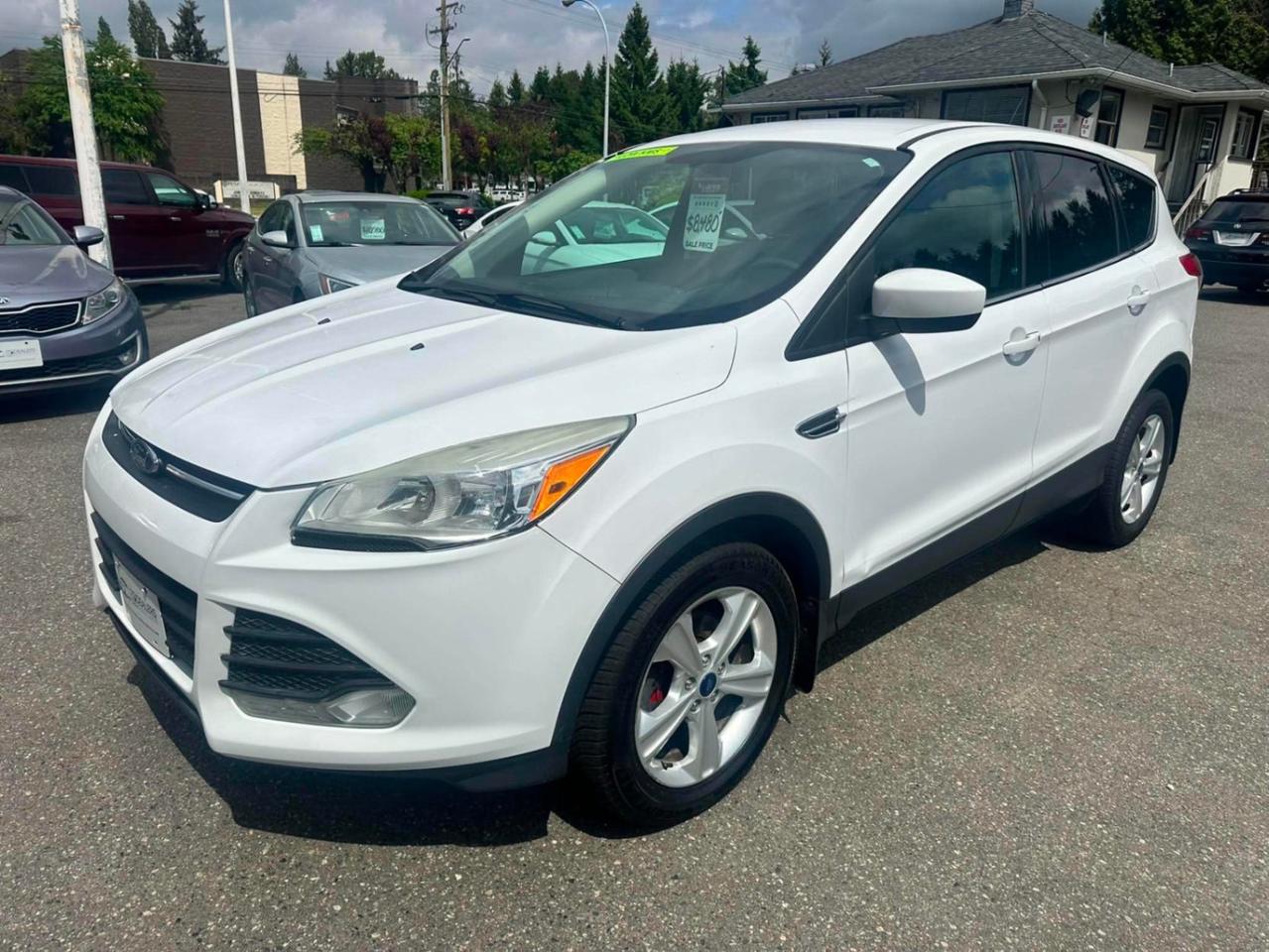 <p> 2014 Ford Escape SE EcoBoost </p><p>Only 139,729 KM! </p><p>Loaded with great features:<br> EcoBoost Engine<br> Automatic Transmission<br> Heated Seats<br> Backup Camera<br> Bluetooth<br> Air Conditioning<br> Cruise Control<br> Tilt Steering<br> Power Windows, Locks & Mirrors<br> Factory Alloy Wheels<br> Comfortable Cloth Interior<br> Seats 5 Passengers</p><p>Clean, reliable, fuel efficient SUV ready for the road! </p><p>Administration Fee $450</p><p>Dealer# 26220</p><span id=jodit-selection_marker_1779229347140_9822065174736136 data-jodit-selection_marker=start style=line-height: 0; display: none;></span> <p><br></p><p>Excellent, Affordable Lubrico Warranty Options Available on ALL Vehicles!</p><p><span style=background-color: rgba(var(--bs-white-rgb),var(--bs-bg-opacity)); color: var(--bs-body-color); font-family: open-sans, -apple-system, BlinkMacSystemFont, "Segoe UI", Roboto, Oxygen, Ubuntu, Cantarell, "Fira Sans", "Droid Sans", "Helvetica Neue", sans-serif; font-size: var(--bs-body-font-size); font-weight: var(--bs-body-font-weight); text-align: var(--bs-body-text-align);>All Vehicles are Safety Inspected by a 3rd Party Inspection Service.&nbsp;</span><br><br>We speak English, French, German, Punjabi, Hindi and Urdu Language!&nbsp;</p><p><br>We are proud to have sold over 15,000 vehicles to our customers throughout B.C. from this same&nbsp;location in Surrey.<span id=jodit-selection_marker_1747949601815_3502933354387793 data-jodit-selection_marker=start style=line-height: 0; display: none;></span></p><p><br>What Makes Us Different? <br>All of our vehicles have been sent to us from new car dealerships. They are all trade-ins and we are a large remarketing centre for the lower mainland new car dealerships. We do not purchase vehicles at auctions or from private sales. <br> <br>Administration Fee of $450<br> <br>Disclaimer: <br>Vehicle options are inputted from a VIN decoder. As we make our best effort to ensure all details are accurate we can not guarantee the information that is decoded from the VIN. Please verify any options before purchasing the vehicle. <br> <br>B.C. Dealers Trade-In Centre <br>14458 104th Ave. <br>Surrey, BC <br>V3R1L9 <br>DL# 26220</p><p> <br> </p><p>6-0-4-5-8-5-1-8-3-1</p>