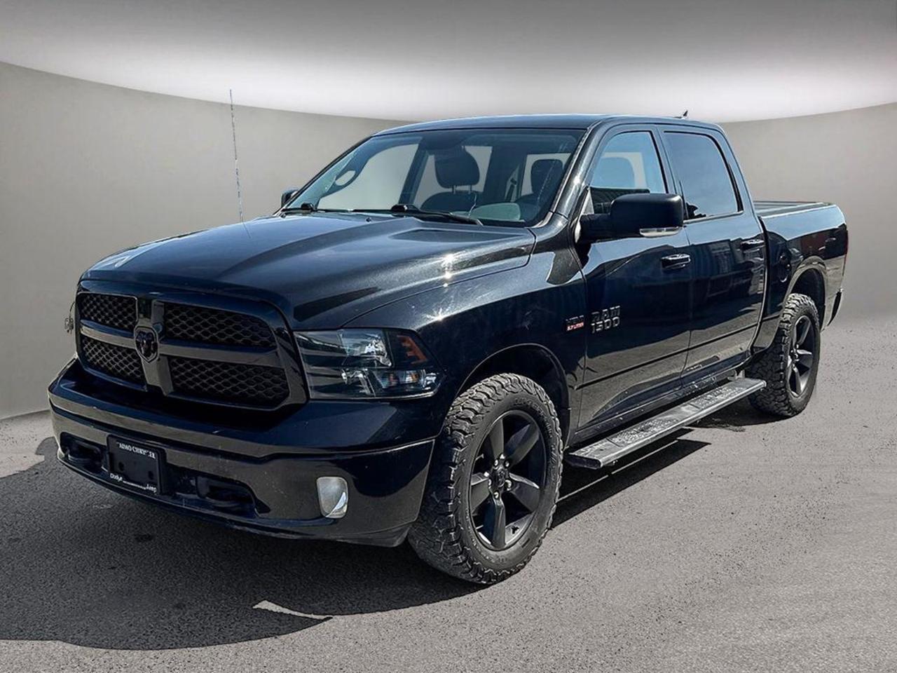 Discover rugged capability and modern comfort with this pre-owned 2018 Ram 1500 Big Horn 4x4 Crew Cab in sleek Black exterior and Gray interior. Powered by a strong 5.7L HEMI V8 with FuelSaver MDS and an 8-speed automatic transmission, this truck delivers both power and efficiency.Enjoy premium features like heated front seats, a leather-wrapped steering wheel, and an 8.4 touchscreen with Apple CarPlay and Android Auto for seamless connectivity. The spacious crew cab offers comfort and versatility with a 60/40 rear split-folding seat, rear power sliding window, and fold-flat load floor.Tow with confidence using the Class IV hitch receiver, electronic trailer brake controller, and trailer tow mirrors. Safety is enhanced by the ParkView rear backup camera, blind-spot detection, and advanced stability controls.Complete with LED bed lighting, remote start, dual-zone climate control, and bright 20 semi-gloss black wheels, this Ram 1500 combines toughness with luxury. Ready for work or playschedule your test drive today and experience the power and style of the Ram Big Horn!