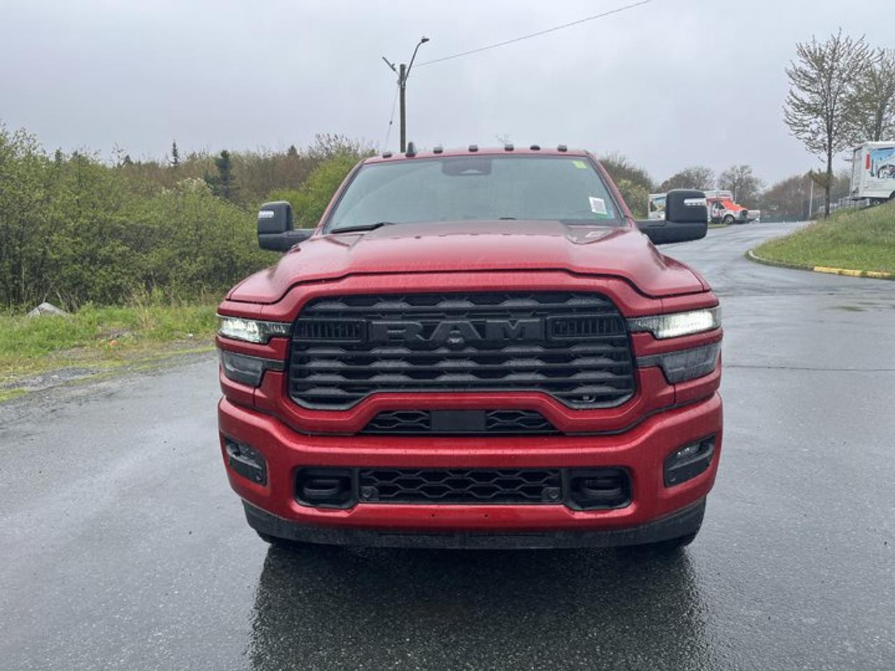 This brand new 2026 RAM 2500 Big Horn is built for hard work and long days, with the strength Halifax truck buyers want in a heavy-duty pickup. Finished in Red with a Black interior, this four-door truck pairs bold style with diesel capability, automatic shifting, and confident 4-wheel drive for year-round use.At Steele Halifax Chrysler Dodge Jeep Ram FIAT in Halifax, this 2026 RAM 2500 Big Horn delivers proven heavy-duty performance with the added comfort of a heated steering wheel and the convenience of an auto-dimming rearview mirror. Its 6.7-litre intercooled turbo diesel I-6 is made to handle demanding tasks with steady power and strong pulling confidence.FEATURES OF THE 2500 Big HornHeavy-duty pickup built for demanding workFour-door cab adds everyday practicalityRed exterior with bold road presenceBlack interior with durable, clean lookTRUCK FEATURESTurbo diesel power for serious pulling4-wheel drive adds traction off-roadHeavy-duty chassis supports tough jobsite useAutomatic transmission helps smooth towing responseADVANCED SAFETY FEATURESAuto-dimming rearview mirror cuts night glare4-wheel drive helps improve road tractionHeavy-duty frame supports stable truck controlLarge pickup design offers strong visibilityPERFORMANCE AND EFFICIENCY6.7-litre turbo diesel I-6 powerAutomatic transmission supports smooth gear changesDiesel engine delivers strong low-end torque4-wheel drive boosts all-surface confidenceCOMFORT AND CONVENIENCEHeated steering wheel adds cold-weather comfortFour full doors ease cabin accessSpacious cabin suits work and travelAuto-dimming mirror improves driving comfortTECHNOLOGY AND CONNECTIVITYClear driver information in easy viewAutomatic transmission simplifies daily drivingFunctional controls support quick operationModern truck layout feels user-friendlyCARGO SPACEPickup bed handles large work itemsCabin offers room for personal gearFour-door layout helps carry passengersHeavy-duty design supports demanding cargo tasksWHAT OTHER OWNERS LIKEStrong diesel torque for heavy jobs4-wheel drive for winter confidenceComfortable cabin for long workdaysHeavy-duty capability for towing needsThis 2026 RAM 2500 Big Horns VIN is: 3C6UR5DL1TG287462.We invite you to book a viewing and test drive at your earliest convenience