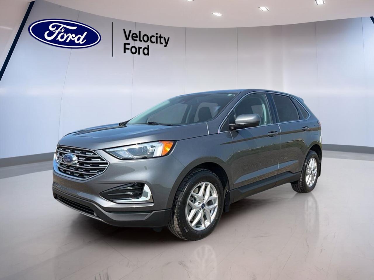 // ACCIDENT FREE!! //
// SINGLE OWNER! //

This 2022 Ford Edge SEL AWD  is a smart SUV for daily life in Moose Jaw. It has a grey exterior, a black interior, 4 doors, and 41,258 km. CARFAX Canada reports no accident, and CARFAX Canada also reports a single owner for added peace of mind.

Powered by a 2.0-litre unleaded engine with an 8-speed automatic transmission, this 2022 Ford Edge SEL AWD  delivers smooth response and confident all-wheel-drive traction. Its practical feature set adds comfort, useful technology, and the everyday versatility many drivers want in a used Ford SUV.

FEATURES OF THE Edge SEL AWD 

»» All-wheel drive for year-round confidence
»» 2.0-litre engine with automatic transmission
»» Power liftgate for easier cargo access
»» Heated front seats for cold mornings

ADVANCED SAFETY FEATURES

»» Backup camera helps with safer reversing
»» Lane departure warning adds extra awareness
»» Blind spot monitor supports lane changes
»» Side and head airbags enhance protection

PERFORMANCE AND EFFICIENCY

»» 2.0-litre unleaded engine balances daily power
»» 8-speed automatic supports smooth shifting
»» All-wheel drive improves traction year-round
»» Stability control helps maintain road composure

COMFORT AND CONVENIENCE

»» Heated front seats boost winter comfort
»» Dual-zone climate control aids cabin comfort
»» Remote starter helps prepare the cabin
»» Power driver seat adds easy adjustment

TECHNOLOGY AND CONNECTIVITY

»» Bluetooth integration supports hands-free calling
»» WiFi hotspot helps keep devices connected
»» Steering wheel audio controls add ease
»» Satellite radio expands entertainment choices

CARGO SPACE

»» Power liftgate simplifies cargo area access
»» Rear trunk access improves daily loading
»» Spare tire adds practical travel backup
»» Four-door design supports passenger flexibility

AWARDS & RECOGNITIONS

»» Top Safety Pick, Insurance Institute for Highway Safety, 2022

WHAT OTHER OWNERS LIKE

»» Smooth ride quality for daily driving
»» Useful all-wheel drive in poor weather
»» Comfortable cabin with easy controls
»» Strong cargo versatility for family needs

This used Ford Edge is well equipped with cruise control, power steering, anti-lock braking system, stability control, child safety locks, automatic headlights, LED headlamps, tinted windows, a rear spoiler, heated mirrors, electric mirrors, power windows, and rear window defroster. These features help make every trip simpler and more comfortable.

Inside, you will find front air conditioning, automatic climate control, dual-zone climate control, ambient lighting, a leather steering wheel, an adjustable steering wheel, illuminated vanity mirrors, driver lumbar support, and push-button start. The cabin is designed to feel easy to use, comfortable in all seasons, and ready for busy days.

This Ford also includes a backup camera, tire pressure monitoring, an auto-dimming rearview mirror, automatic door locks, remote trunk release, remote start, Bluetooth integration, satellite radio, and a WiFi hotspot. With practical safety, comfort, and connectivity features already in place, this Edge is ready for your next drive.

This 2022 Ford Edge SEL AWD VIN is: 2FMPK4J95NBA65683.