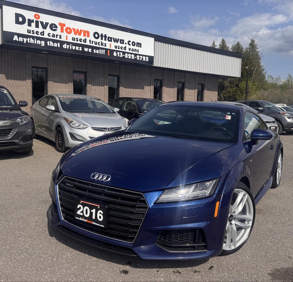 <p data-start=0 data-end=600>2016 AUDI TT QUATTRO &ndash; SPORTY, LUXURIOUS & PERFORMANCE-DRIVEN!<br data-start=62 data-end=65>LIKE NEW &ndash; ICONIC AUDI DESIGN WITH A REFINED, EXHILARATING DRIVING EXPERIENCE!<br data-start=143 data-end=146 data-is-only-node=>2.0T TURBO I4 ENGINE + QUATTRO AWD &ndash; POWERFUL, RESPONSIVE & CONFIDENT IN ALL CONDITIONS!<br data-start=234 data-end=237>PREMIUM TRIM LOADED WITH HIGH-END FEATURES: LEATHER/ALCANTARA SPORT SEATS, VIRTUAL COCKPIT DIGITAL DISPLAY, BLUETOOTH, PREMIUM AUDIO, DUAL-ZONE CLIMATE CONTROL, KEYLESS ENTRY & PUSH-BUTTON START!<br data-start=432 data-end=435>PERFECT FOR DRIVING ENTHUSIASTS OR ANYONE LOOKING FOR A STYLISH, FUN & LUXURY COUPE &ndash; SHARP HANDLING, COMFORTABLE & BUILT WITH PRECISION!<br data-start=572 data-end=575>EASY FINANCING AVAILABLE!</p><p data-start=602 data-end=639>ADVERTISED PRICE IS OUR FINANCE PRICE</p><p data-start=641 data-end=850 data-is-last-node= data-is-only-node=>DRIVETOWNOTTAWA.COM &ndash; COME VISIT US / VENEZ NOUS VISITER!<br data-start=698 data-end=701>TAXES AND LICENSING EXTRA. SEE DRIVETOWNOTTAWA.COM FOR CASH PRICE FINANCING CHARGES APPLY (BANK FEES, PPSA, INTEREST). QUEBEC SAFETY FEE APPLICABLE.</p>