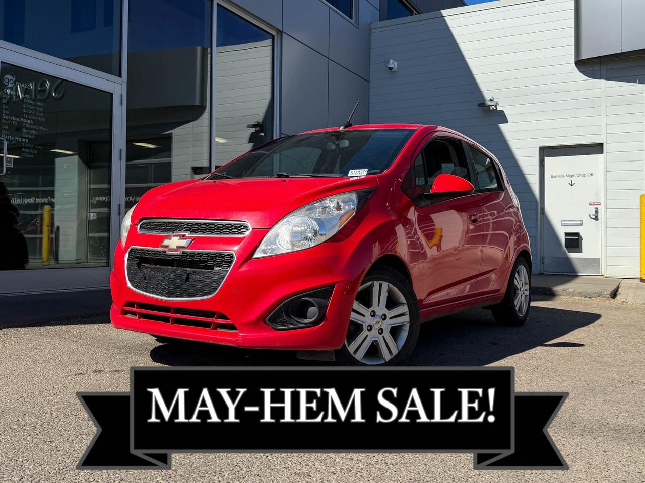 Looking for a reliable and fuel-efficient city car? Check out this pre-owned 2013 Chevrolet Spark LT! Finished in sleek Red, its powered by the fuel-saving ECOTEC 1.2L 4-cylinder engine paired with an easy-to-use 4-speed automatic transmission. Enjoy comfort and convenience with features like Chevrolet MyLink touchscreen radio, SiriusXM, cloth high-back bucket seats, and single-zone climate control. With 10 airbags, electronic stability control, and ABS, safety is well-covered. Compact yet versatile, the Spark offers fold-flat rear seats, keyless entry, and great storage options. Ideal for urban drives, this well-equipped hatchback delivers smart style and dependability at a great value. Come test drive it today!Go Mazda is an AMVIC licensed businessThis vehicle has been registered in the province ofBritish Columbia
