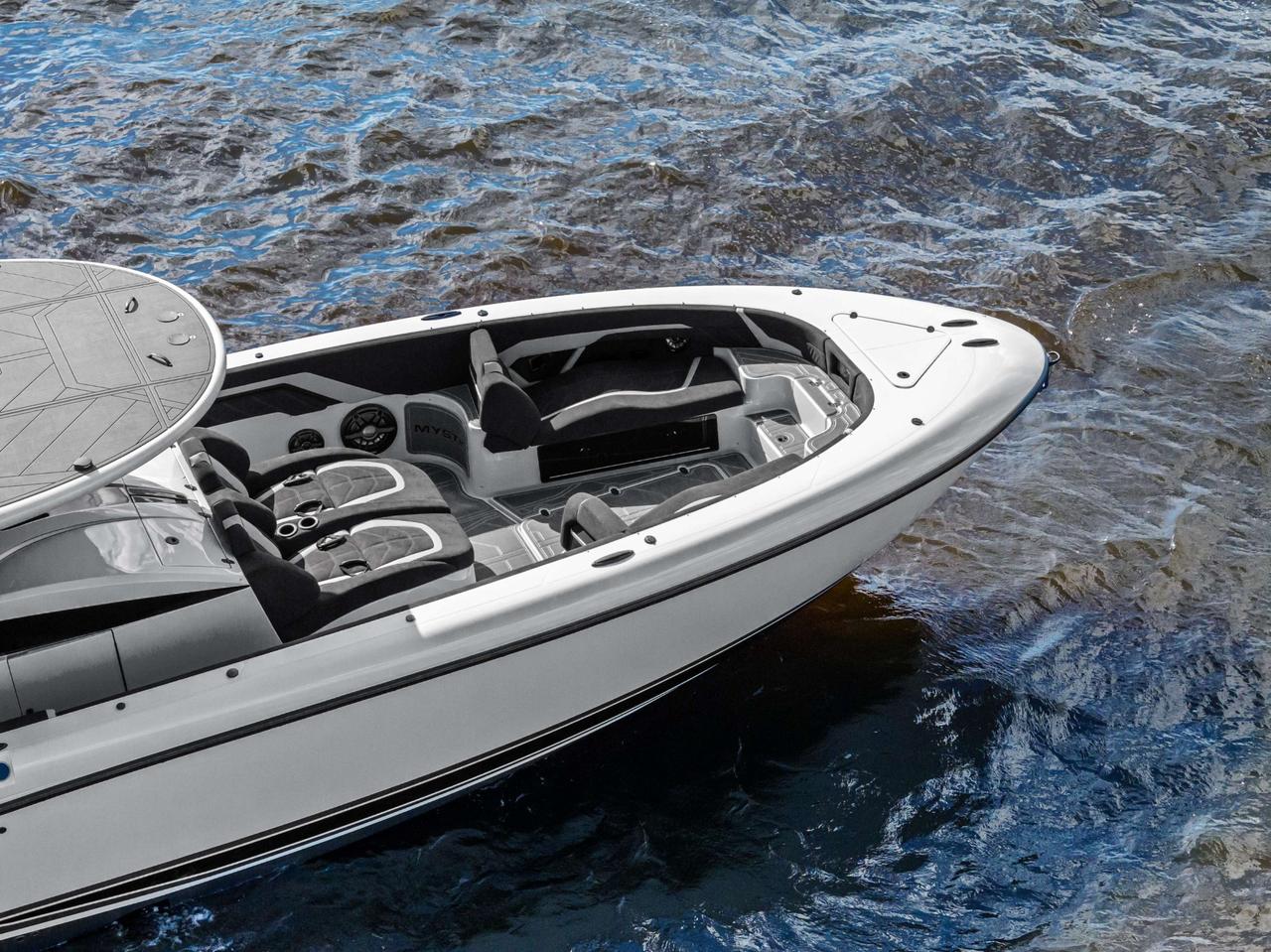2027 Mystic Powerboats M4200 Center Console High-performance luxury center console is powered by quad 2026 Mercury Racing 500R outboards producing a combined 2,000 HP. Featuring a modified-vee fibreglass hull, joystick control, Seakeeper stabil Photo