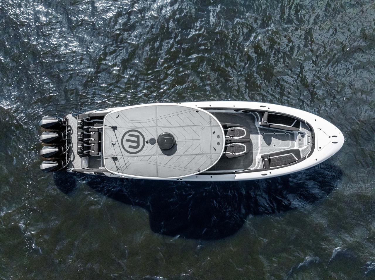 2027 Mystic Powerboats M4200 Center Console High-performance luxury center console is powered by quad 2026 Mercury Racing 500R outboards producing a combined 2,000 HP. Featuring a modified-vee fibreglass hull, joystick control, Seakeeper stabil Photo
