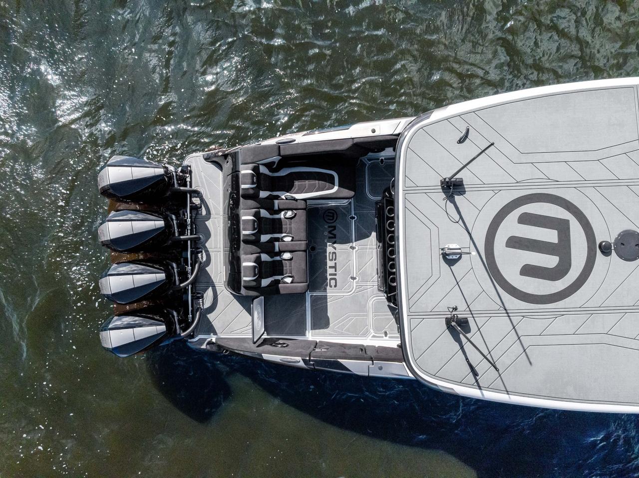 2027 Mystic Powerboats M4200 Center Console High-performance luxury center console is powered by quad 2026 Mercury Racing 500R outboards producing a combined 2,000 HP. Featuring a modified-vee fibreglass hull, joystick control, Seakeeper stabil Photo