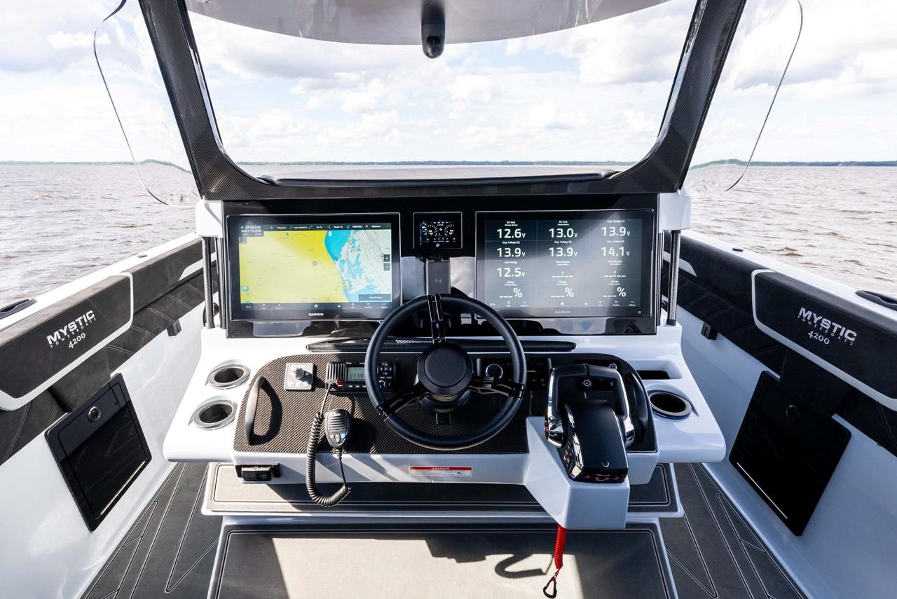 2027 Mystic Powerboats M4200 Center Console High-performance luxury center console is powered by quad 2026 Mercury Racing 500R outboards producing a combined 2,000 HP. Featuring a modified-vee fibreglass hull, joystick control, Seakeeper stabil Photo