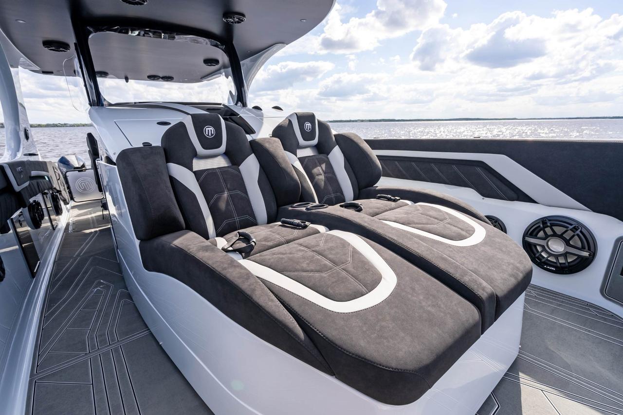 2027 Mystic Powerboats M4200 Center Console High-performance luxury center console is powered by quad 2026 Mercury Racing 500R outboards producing a combined 2,000 HP. Featuring a modified-vee fibreglass hull, joystick control, Seakeeper stabil Photo
