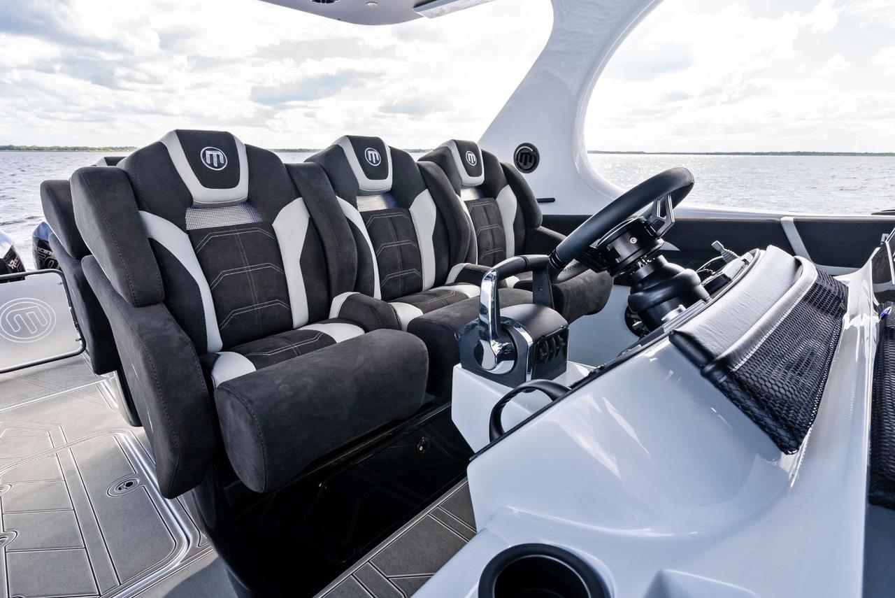 2027 Mystic Powerboats M4200 Center Console High-performance luxury center console is powered by quad 2026 Mercury Racing 500R outboards producing a combined 2,000 HP. Featuring a modified-vee fibreglass hull, joystick control, Seakeeper stabil Photo