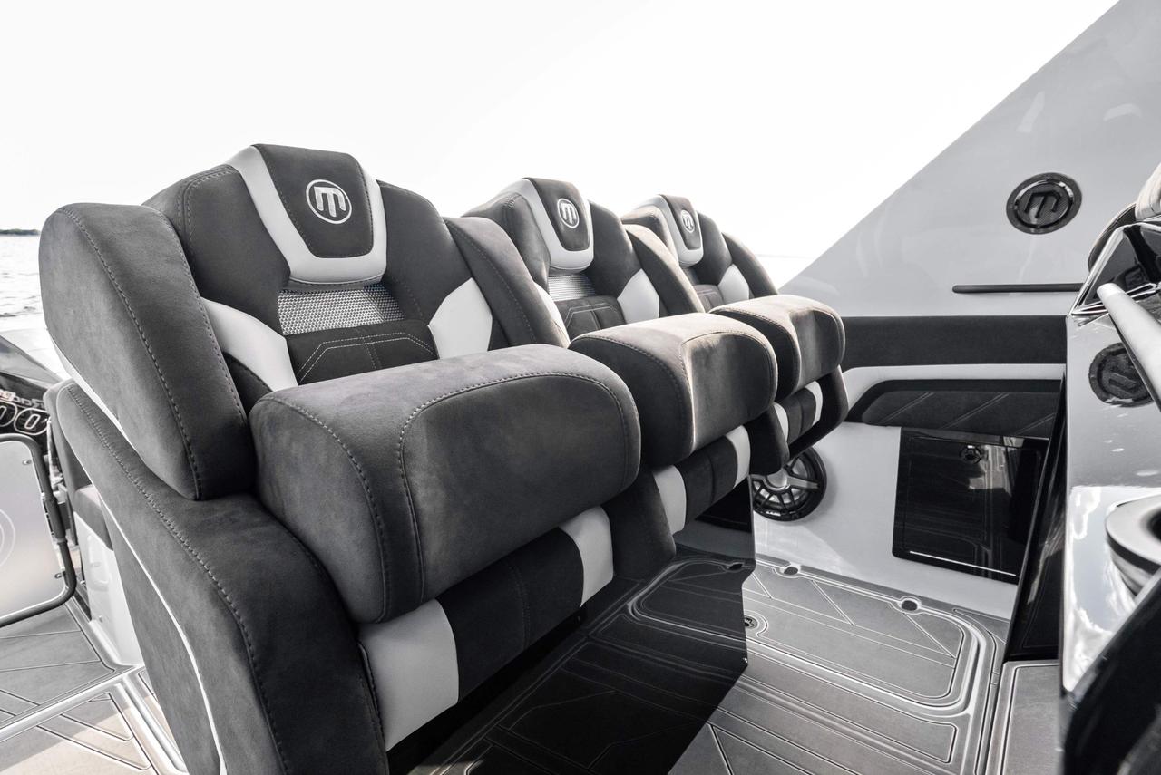 2027 Mystic Powerboats M4200 Center Console High-performance luxury center console is powered by quad 2026 Mercury Racing 500R outboards producing a combined 2,000 HP. Featuring a modified-vee fibreglass hull, joystick control, Seakeeper stabil Photo