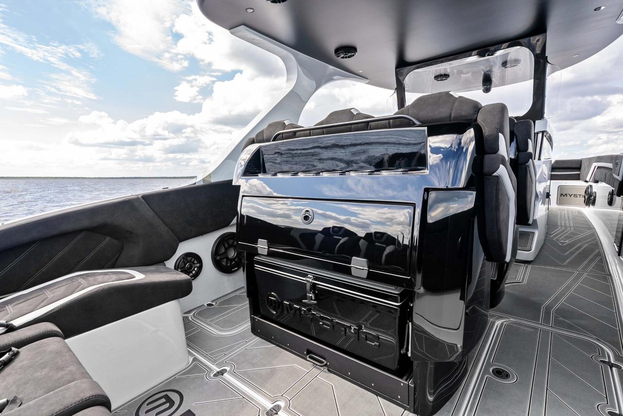 2027 Mystic Powerboats M4200 Center Console High-performance luxury center console is powered by quad 2026 Mercury Racing 500R outboards producing a combined 2,000 HP. Featuring a modified-vee fibreglass hull, joystick control, Seakeeper stabil Photo