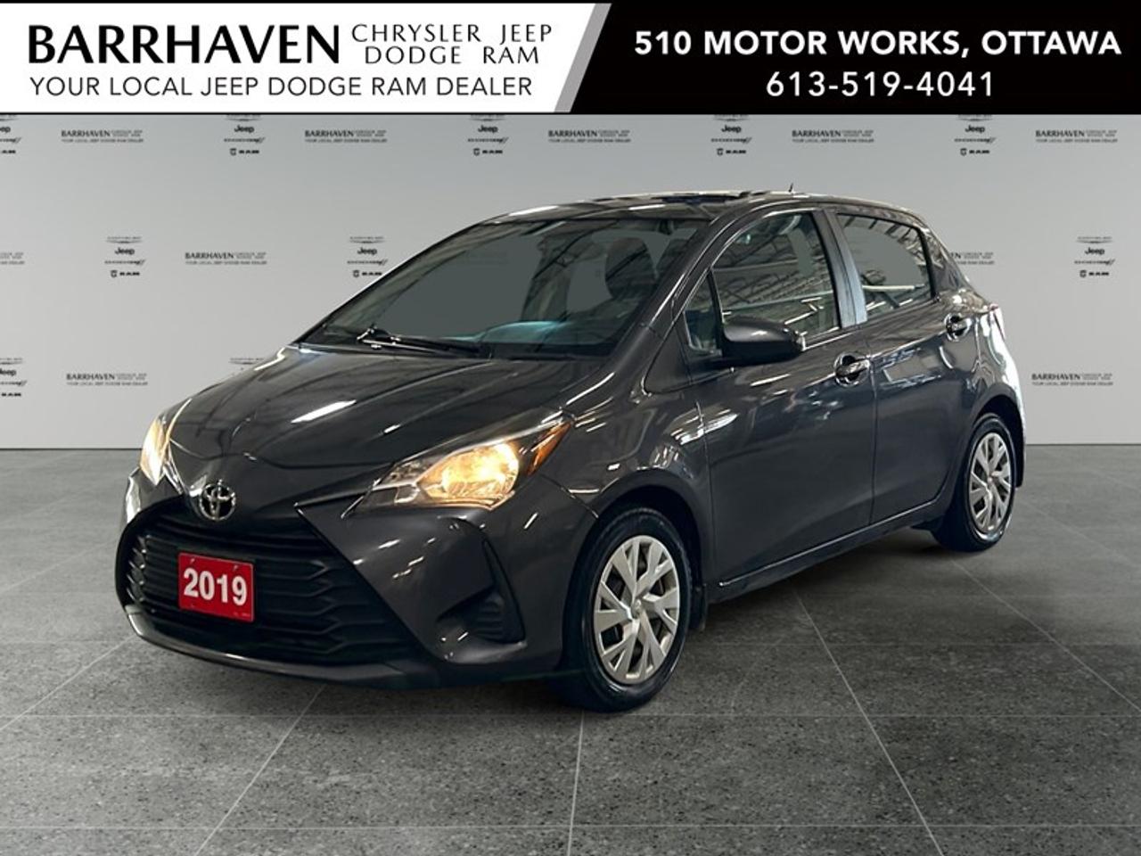 Experience the reliable agility of the 2019 Toyota Yaris Hatchback in a sleek gray finish with an efficient Front Wheel Drive (FWD) system. This compact hatchback is perfect for navigating urban streets with ease. The exterior of the Yaris boasts a modern design that seamlessly blends style and function, complemented by its practical five-door configuration. Inside, the interior promises comfort with heated seats, perfect for those chilly Canadian mornings. Enjoy the convenience of power windows and keyless entry, making every journey a breeze. Stay connected and safe with integrated technology features such as Bluetooth connectivity and a user-friendly backup camera. The Yaris LE Hatch is equipped with essential safety features like brake assist and lane assist, ensuring peace of mind on every drive. Additionally, cruise control allows for a relaxing journey on long drives. Whether youre a city commuter or a young professional seeking a reliable and efficient vehicle, the 2019 Toyota Yaris Hatchback LE will meet your needs. Contact our dealership today for more information and take this ultra-low kilometer gem for a test drive.