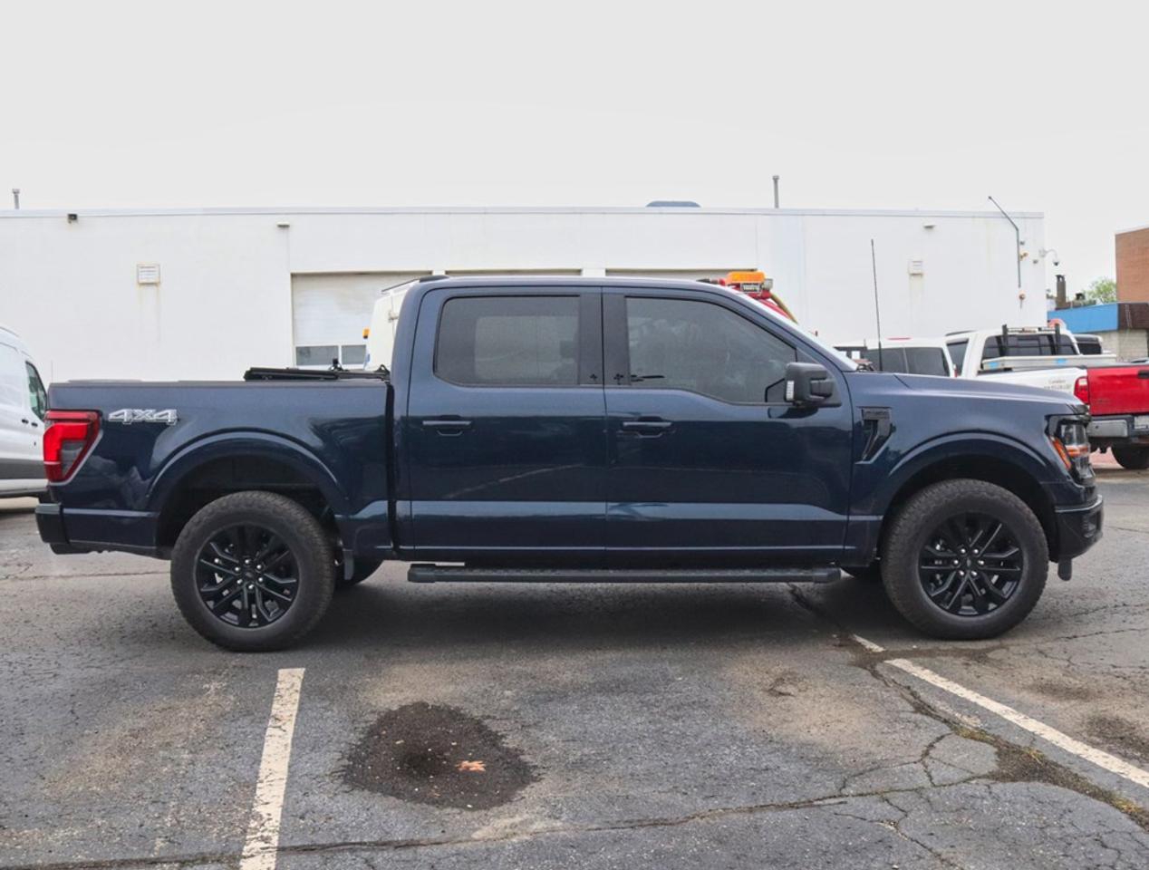 2025 Ford F-150 XLT | 4X4 | 2.7L | 303A |BLK PK PLS |ROOF | BD UTL Photo