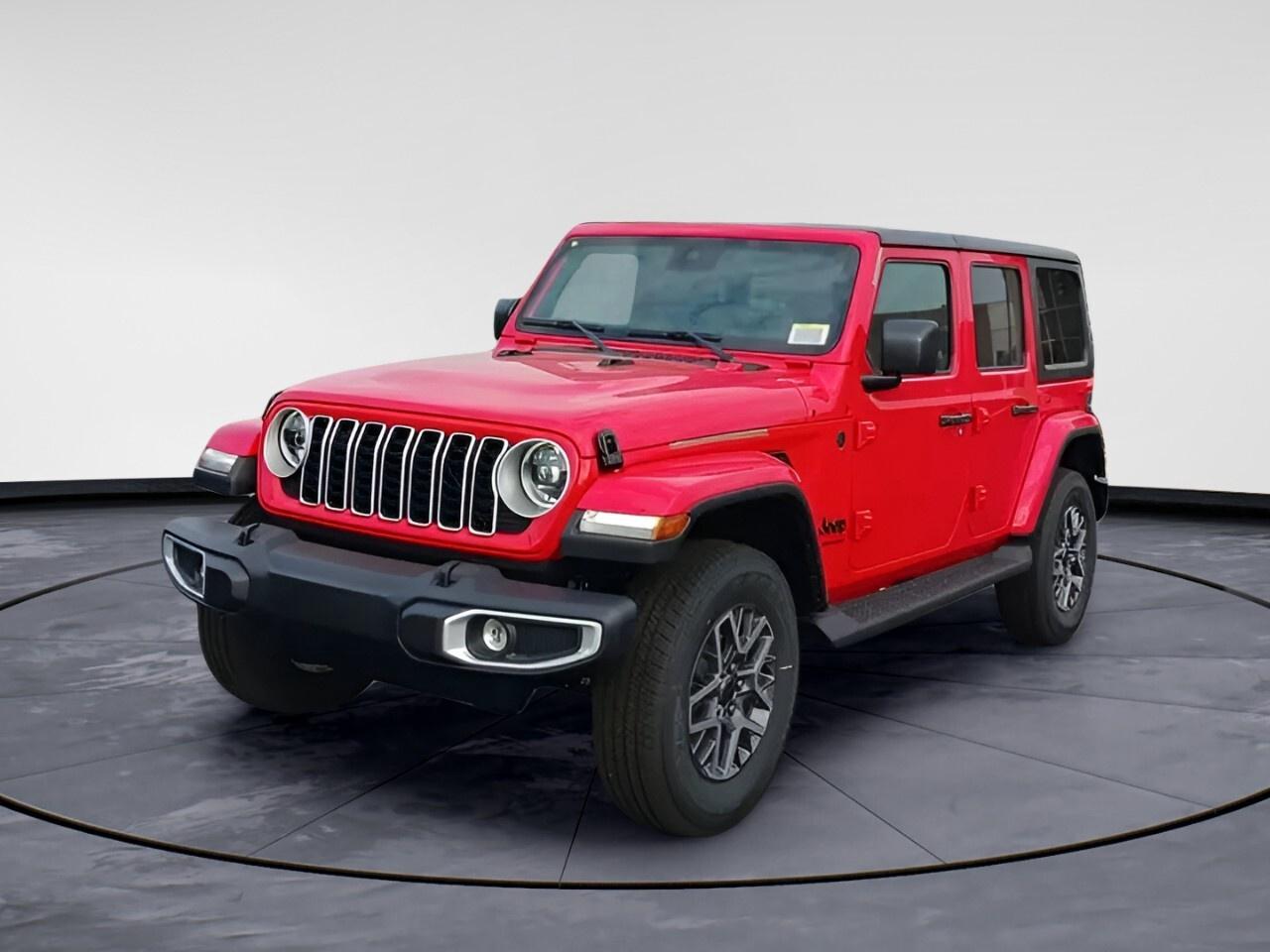 The 2025 Jeep Wrangler Sahara, featuring a vibrant red exterior and a robust 4x4 drivetrain, promises exceptional performance both on and off the road. The automatic transmission ensures smooth handling for all your adventures.

Step inside and enjoy the contrast of black interiors, where comfort meets style. This SUV is equipped with practical features like air conditioning and power windows, while the alloy wheels enhance its bold appearance. With the added convenience of heated seats and a heated steering wheel, driving in colder months becomes a pleasure. The keyless entry and remote start add an extra layer of modern convenience.

Embrace the 2025 Wrangler Saharas state-of-the-art technology including a backup camera, Bluetooth connection, and smart device integration, keeping you connected on every journey. Safety is a top priority with features like adaptive cruise control and brake assist, supported by the reliability of the ENGINE: 3.6L PENTASTAR VVT V6 W/ESS that includes an engine oil cooler for optimal performance.

Whether youre an avid adventurer or simply value a reliable family vehicle, the 2025 Jeep Wrangler Sahara is built to meet diverse needs. Contact Windsor Chrysler today to discover more about how this vehicle can be the right fit for you.