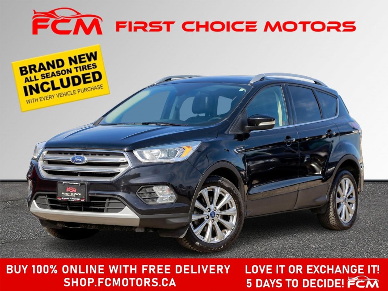** ** SPECIAL LIMITED TIME OFFER ** ** PURCHASE ANY VEHICLE THIS WEEK AND RECEIVE 4 BRAND-NEW ALL-SEASON TIRES AT NO ADDITIONAL COST!!! DON   T MISS THIS EXCLUSIVE CHANCE TO UPGRADE YOUR RIDE AND STAY PREPARED FOR ANY WEATHER!!! <br><br>EXCITING NEWS FROM FIRST CHOICE MOTORS! Our brand-new online showroom is now open to the public, bringing the ultimate car shopping experience right to your fingertips! Enjoy a 100% online car shopping experience, with over 500 certified vehicles in stock, comprehensive protection plans, and thousands of new auto parts & accessories available! Plus, for a limited time, were offering FREE deliveries across Ontario on all vehicle purchases! Dont miss out   visit Shop.fcmotors.ca to find and upgrade your perfect vehicle today!<br><br>Welcome to First Choice Motors, the largest car dealership in Toronto of pre-owned cars, SUVs, and vans priced between $5000-$15,000. With an impressive inventory of over 300 vehicles in stock, we are dedicated to providing our customers with a vast selection of affordable and reliable options. <br><br>Were thrilled to offer a used 2017 Ford Escape TITANIUM, black color with 139,000km (STK#9923) This vehicle was $11990 NOW ON SALE FOR $10990. It is equipped with the following features:<br>- Automatic Transmission<br>- Leather Seats<br>- Sunroof<br>- Heated seats<br>- Navigation<br>- All wheel drive<br>- Bluetooth<br>- Reverse camera<br>- Alloy wheels<br>- Power windows<br>- Power locks<br>- Power mirrors<br>- Air Conditioning<br><br>At First Choice Motors, we believe in providing quality vehicles that our customers can depend on. All our vehicles come with a 36-day guarantee on all safety related items. We also offer additional warranty options up to 5 years for our customers who want extra peace of mind.<br><br>Furthermore, all our vehicles are sold fully certified with brand new brakes rotors and pads, a fresh oil change, and brand new set of all-season tires installed & balanced. You can be confident that this car is in excellent condition and ready to hit the road.<br><br>At First Choice Motors, we believe that everyone deserves a chance to own a reliable and affordable vehicle. Thats why we offer financing options with low interest rates starting at 7.9% O.A.C. Were proud to approve all customers, including those with bad credit, no credit, students, and even 9 socials. Our finance team is dedicated to finding the best financing option for you and making the car buying process as smooth and stress-free as possible.<br><br>Our dealership is open 7 days a week to provide you with the best customer service possible. We carry the largest selection of used vehicles for sale under $9990 in all of Ontario. We stock over 300 cars, mostly Hyundai, Chevrolet, Mazda, Honda, Volkswagen, Toyota, Ford, Dodge, Kia, Mitsubishi, Acura, Lexus, and more. With our ongoing sale, you can find your dream car at a price you can afford. Come visit us today and experience why we are the best choice for your next used car purchase!<br><br>All prices include $22.00 OMVIC Fee.  Excludes, license plates, ownership registration and ONTARIO HST (13%)<br>*No Credit Card payments can be accepted for Vehicle Purchases*
