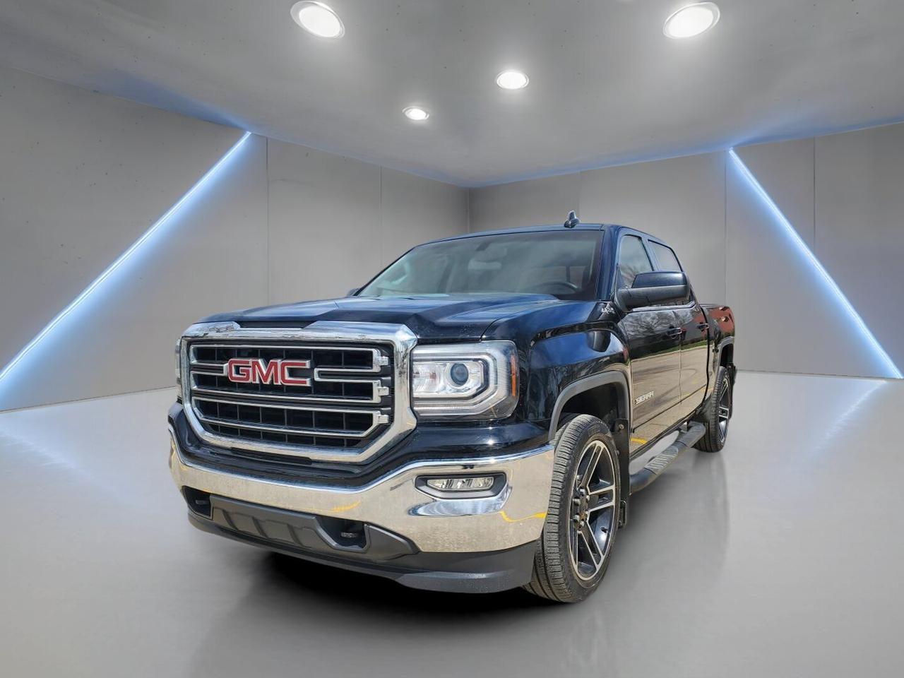All Trades Accepted. In-house Financing Available. Flexible Payments and Zero Down Financing. All Credit Situations Accepted O.A.C

// EXCELLENT CONDITION! //

Built to handle hard work and daily driving with ease, this 2018 GMC Sierra 1500 4WD Crew Cab Short Box SLE delivers proven V8 power, four full doors, and a practical short box layout. Finished in Black with a Grey interior, it shows well and has 118,963 km.

This 2018 GMC Sierra 1500 4WD Crew Cab Short Box SLE is a strong fit for Saskatchewan roads and changing weather. Its 5.3-litre gas engine, automatic transmission, and Four-Wheel Drive give you confident performance for towing, hauling, and commuting around Saskatoon.

FEATURES OF THE Sierra 1500 4WD Crew Cab Short Box SLE
»» 5.3-litre gas V8 with automatic
»» Crew Cab with four full doors
»» Short box for easy manoeuvring
»» Four-Wheel Drive for added traction

TRUCK FEATURES
»» Tows up to 4,853 kg confidently
»» Rear tow hook adds utility
»» Limited slip differential improves traction
»» Short box suits city and work

ADVANCED SAFETY FEATURES
»» Backup camera helps with reversing
»» Anti-lock brakes support controlled stops
»» Stability control adds road confidence
»» Head and side airbags included

PERFORMANCE AND EFFICIENCY
»» 5.3-litre gas engine delivers strong output
»» Six-speed automatic shifts smoothly
»» Four-Wheel Drive handles changing conditions
»» Power steering supports easy control

COMFORT AND CONVENIENCE
»» Front air conditioning keeps cabin comfortable
»» Cruise control supports relaxed highway driving
»» Power windows add everyday convenience
»» Driver lumbar support improves comfort

TECHNOLOGY AND CONNECTIVITY
»» Bluetooth integration supports hands-free calls
»» WiFi hotspot adds mobile connectivity
»» Satellite radio expands entertainment choices
»» Steering wheel audio controls simplify use

CARGO SPACE
»» Crew Cab adds useful interior room
»» Short box handles daily cargo needs
»» Rear trunk access aids loading ease
»» Spare tire adds practical backup

AWARDS & RECOGNITIONS
»» Top Safety Pick, Insurance Institute for Highway Safety, 2018

WHAT OTHER OWNERS LIKE
»» Strong V8 power for daily tasks
»» Comfortable ride on long trips
»» Useful towing and hauling capability
»» Spacious Crew Cab for passengers

The Black exterior gives this GMC truck a clean, bold look, while heated mirrors, electric mirrors, tinted windows, and HID headlights add everyday value. Inside, the Grey cabin is designed for practical use, with an adjustable steering wheel, leather steering wheel, ambient lighting, and illuminated vanity mirrors.

This GMC also includes key features drivers want most in a used pickup. You get ABS, tire pressure monitoring, automatic door locks, passenger airbag sensor, driver airbag, passenger airbag, side impact airbags, head side airbags, HD Radio, and cloth seating. Every detail supports comfort, function, and peace of mind.

For buyers looking for a capable used truck from Platinum Autosport in Saskatoon, this GMC Sierra stands out with the right mix of power, utility, and useful equipment. It is well suited for work, weekend towing, and year-round Canadian driving.

This 2018 GMC Sierra 1500 4WD Crew Cab Short Box SLEs VIN is: 3GTU2MEC2JG564512.

Pre-Owned Vehicle Warranty & Financing ? Platinum Auto Sport Saskatoon

Buy with confidence at Platinum Auto Sport in Saskatoon. We offer comprehensive extended warranty coverage on pre-owned vehicles, powered by SAL Warranty, including mechanical breakdown protection and extended manufacturer (bumper-to-bumper) coverage.

Our protection options include:

Extended Warranty Plans

Guaranteed Asset Protection (GAP Insurance)

Credit / Creditor Insurance (CAP)

Replacement & Appearance Protection

OEM Programs

Theft Deterrent Protection

Looking for used car financing in Saskatoon? We make approvals simple with:

In-House Financing Available

Over 25 Trusted Lending Partners

Special Low-Rate Financing (O.A.C.)

Dealer Exclusive Financing Incentives

Online Pre-Approval Options

Every vehicle includes:

Full Vehicle History Disclosure

Competitive, Transparent Pricing

Trade-Ins Welcome (Cars, Trucks, SUVs, Powersports, Boats & RVs)

Free Delivery Anywhere in Western Canada

For the best selection of quality used cars, trucks, and SUVs in Saskatoon, choose Platinum Auto Sport. Call or text Fernando (General Manager) at (639) 471-1839 or visit www.platinumautosport.com
 today.

Conditions apply. Contact dealer for details.