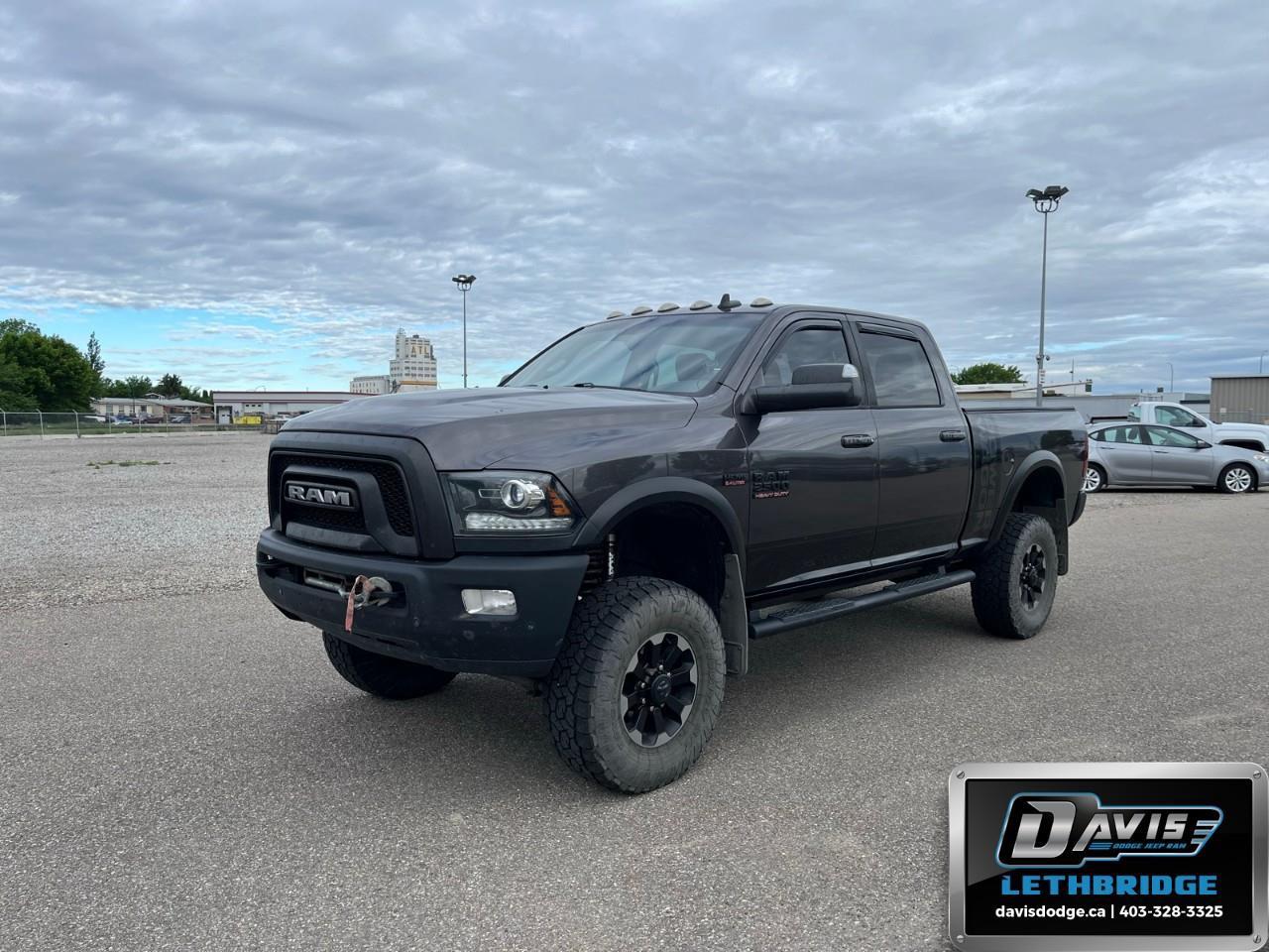 <b>Bluetooth, SiriusXM, Aluminum Wheels, Power Windows, Power Doors!</b><br /> <br /> This comfortable, capable Heavy Duty Ram 2500 is a muscular workhorse ready for any job you put in front of it. This 2018 Ram 2500 is for sale today in Lethbridge.<br /> <br />This 2018 Ram 2500 Heavy Duty delivers exactly what you need: superior capability and exceptional levels of comfort, all backed with proven reliability and durability. Whether you're in the commercial sector or looking at serious recreational towing and hauling, this Ram 2500HD is ready for the job.<br /> <br />This Crew Cab 4X4 pickup has 178,355 km. Stock number 41520 is nice in colour. It has an Automatic transmission and is powered by a 410HP 6.4L 8 Cylinder Engine. <br /> <br /> Our 2500's trim level is Power Wagon. The historic Power Wagon name returns on this off-road beast. This Ram 2500 comes with a powerful HEMI V8, four-wheel drive, all-terrain tires, TruLok front and rear differentials, Ram Articulink suspension for unmatched capability on road and off. Additional features include the Uconnect infotainment system with Bluetooth capability, the Power Wagon appearance package with a bold RAM front grille, unique aluminum wheels, plus it also comes with LED taillights. This vehicle has been upgraded with the following features: Bluetooth, SiriusXM, Aluminum Wheels, Power Windows, Power Doors.<br /> <br />To apply right now for financing use this link: <a href=https://lethbridge.davisdodge.ca/free-credit-check/ target=_blank rel=nofollow noopener noreferrer>https://lethbridge.davisdodge.ca/free-credit-check/</a><br /> <br /><br />Locally Owned & Trusted for Over 35 Years  Davis Dodge in Lethbridge, AB <br /><br /> At Davis Dodge, weve proudly served the Lethbridge community for more than 35 years, offering an unparalleled car buying experience. Dont just take our word for itour Google reviews speak volumes about our commitment to exceptional service. <br /><br /> Delivery & At-Home Test Drives: Convenient options to suit your lifestyle. <br /><br /> Flexible Financing for Everyone: Get the vehicle you need with financing solutions tailored to your situation. <br /><br /> Full Mechanical Inspections & Professional Cleaning: Every vehicle is thoroughly inspected and cleaned before it hits our lot.<br /><br /> We take all makes and models on trade and offer competitive pricing with inventory that changes daily. Whether you're shopping for a Chrysler, Dodge, Jeep, RAM, or FIAT, our AMVIC Licensed dealership makes it easy to browse, buy, and drive away.<br /><br /> Located in Lethbridge, AB, we proudly serve customers in Fort Macleod, Taber, Claresholm, and Coaldale. Shop online or visit us today to experience the best in sales, service, and selection. Standard bank rates apply; taxes are additional.<br /><br /> Vehicle pricing offer shown expires 2026-07-31. <br /> Come by and check out our fleet of 50+ used cars and trucks and 100+ new cars and trucks for sale in Lethbridge. o~o