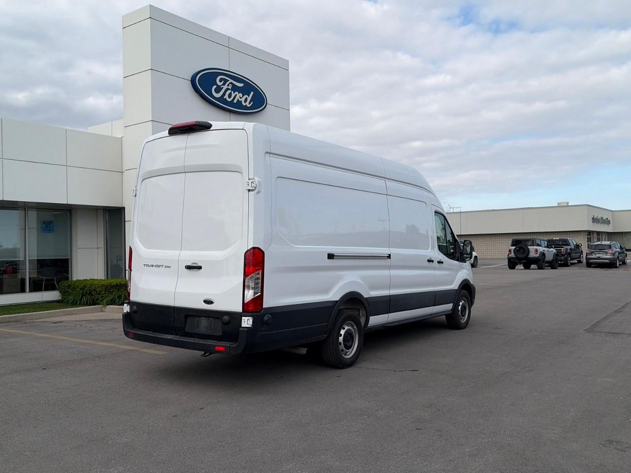 2025 Ford Transit Cargo Van T-250 148" EL Hi Rf 9070 GVWR RWD Photo2