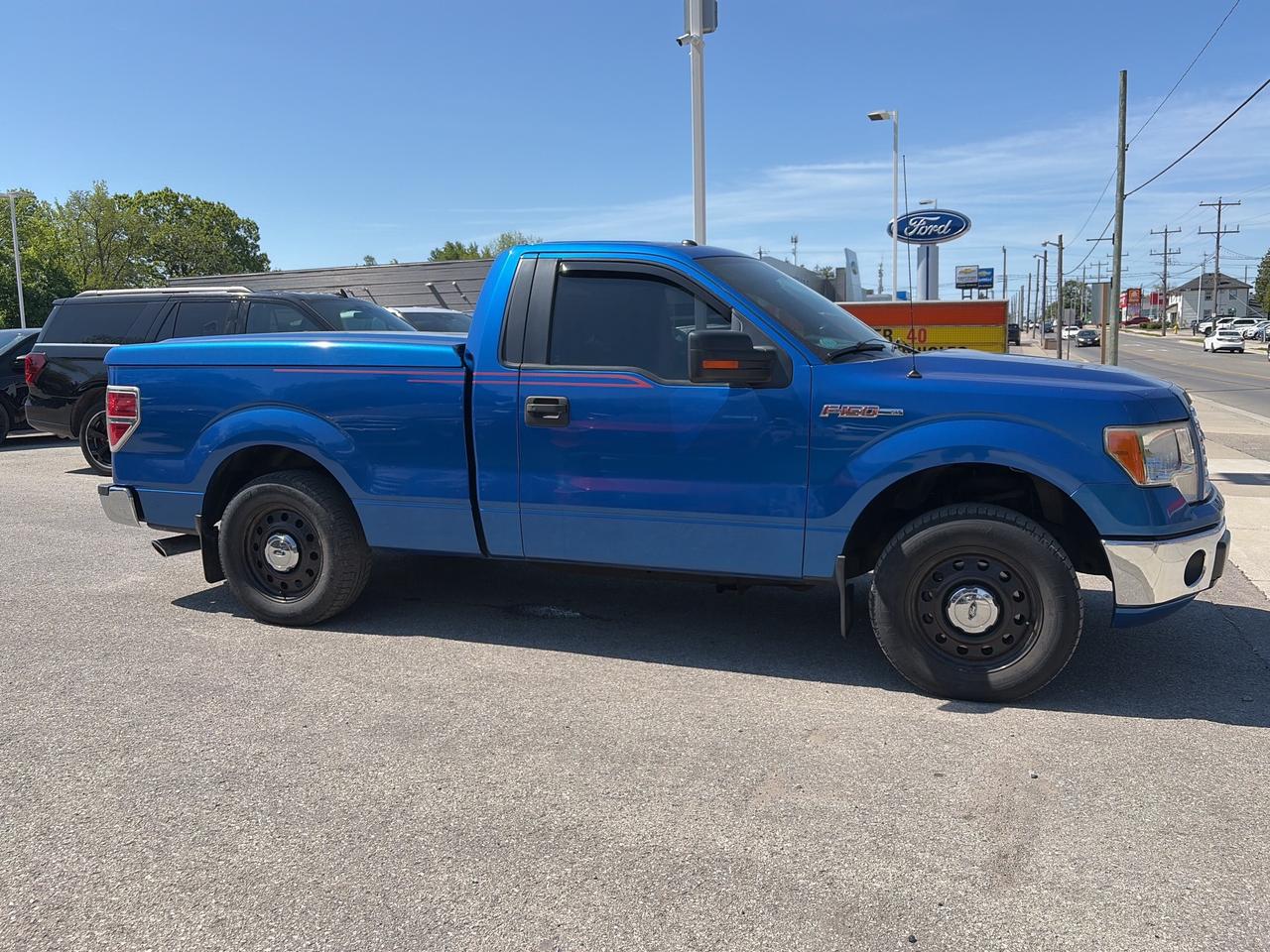 2012 Ford F-150 XLT 2WD Reg Cab 126 Photo