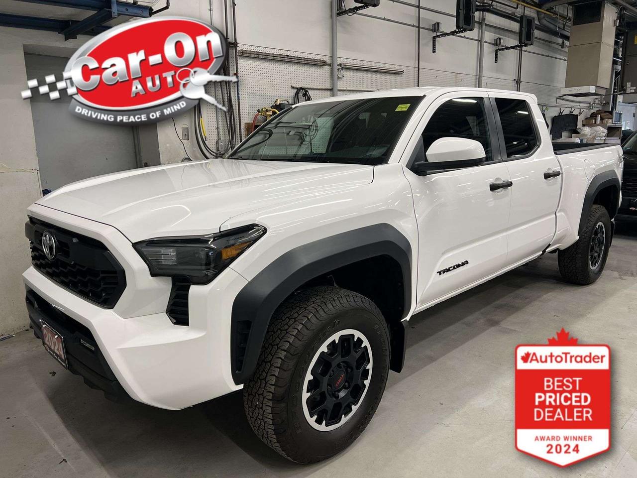 ONLY 23,000KMS!! TRD OFF ROAD Double Cab 4X4 w/ Heated seats, Android Auto/ Apple CarPlay, 17-inch alloys, adaptive cruise control, blind spot monitor, rear cross-traffic alert, pre-collision system, lane departure warning, backup camera, tow package, 6-foot bed w/ bedliner, crawl control, Bilstein shocks, automatic climate control, keyless entry w/ push start, full power group, automatic headlights w/ auto highbeams, Bluetooth and Sirius XM!!