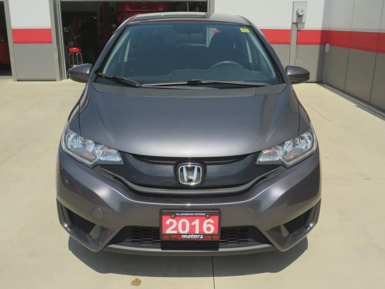 2016 Honda Fit LX | Clean Carfax | Digital Touchscreen | Reverse Camera | AC | Cruise Control | USB and HDMI| Heated Seats | Photo