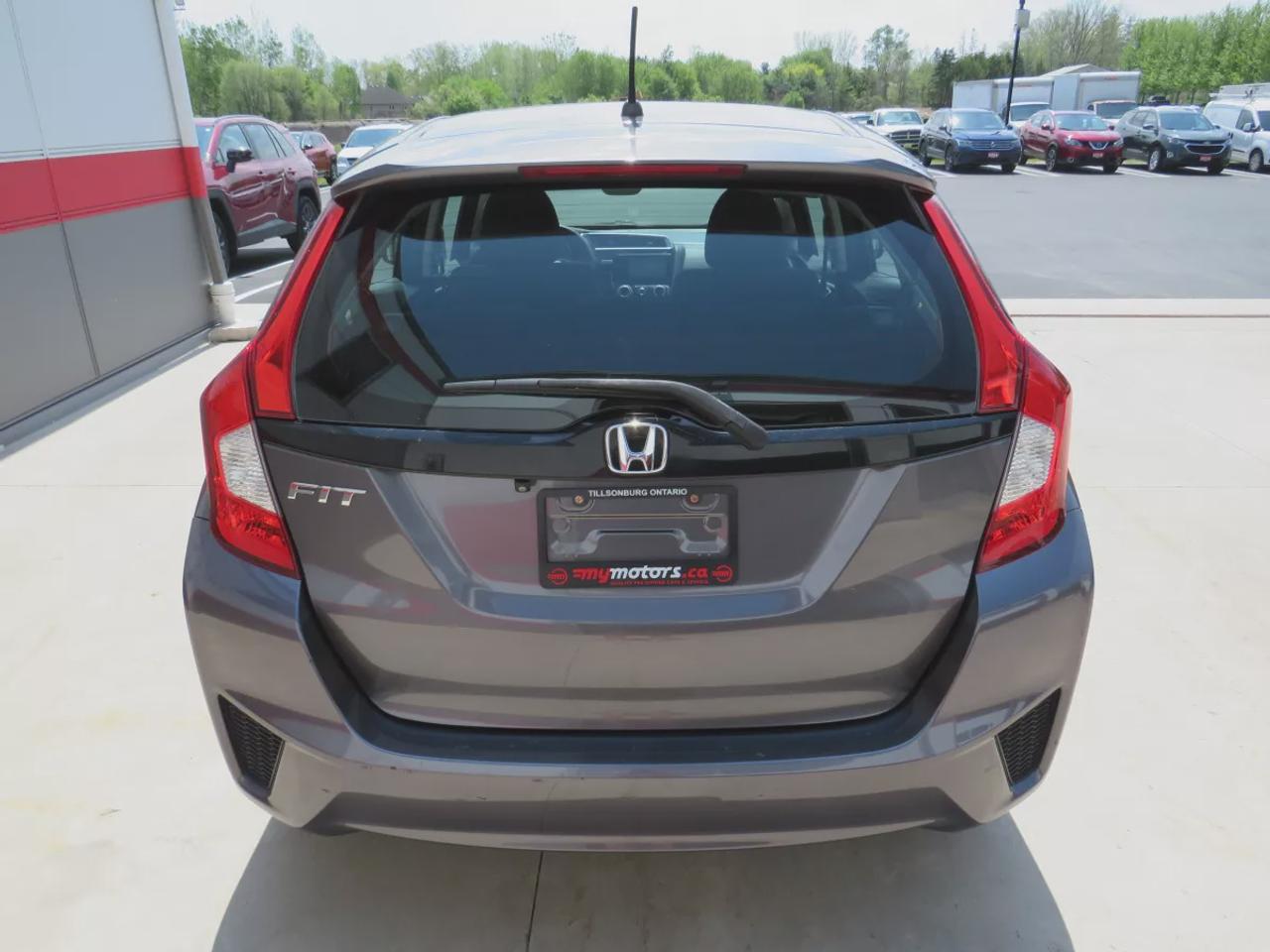 2016 Honda Fit LX | Clean Carfax | Digital Touchscreen | Reverse Camera | AC | Cruise Control | USB and HDMI| Heated Seats | Photo