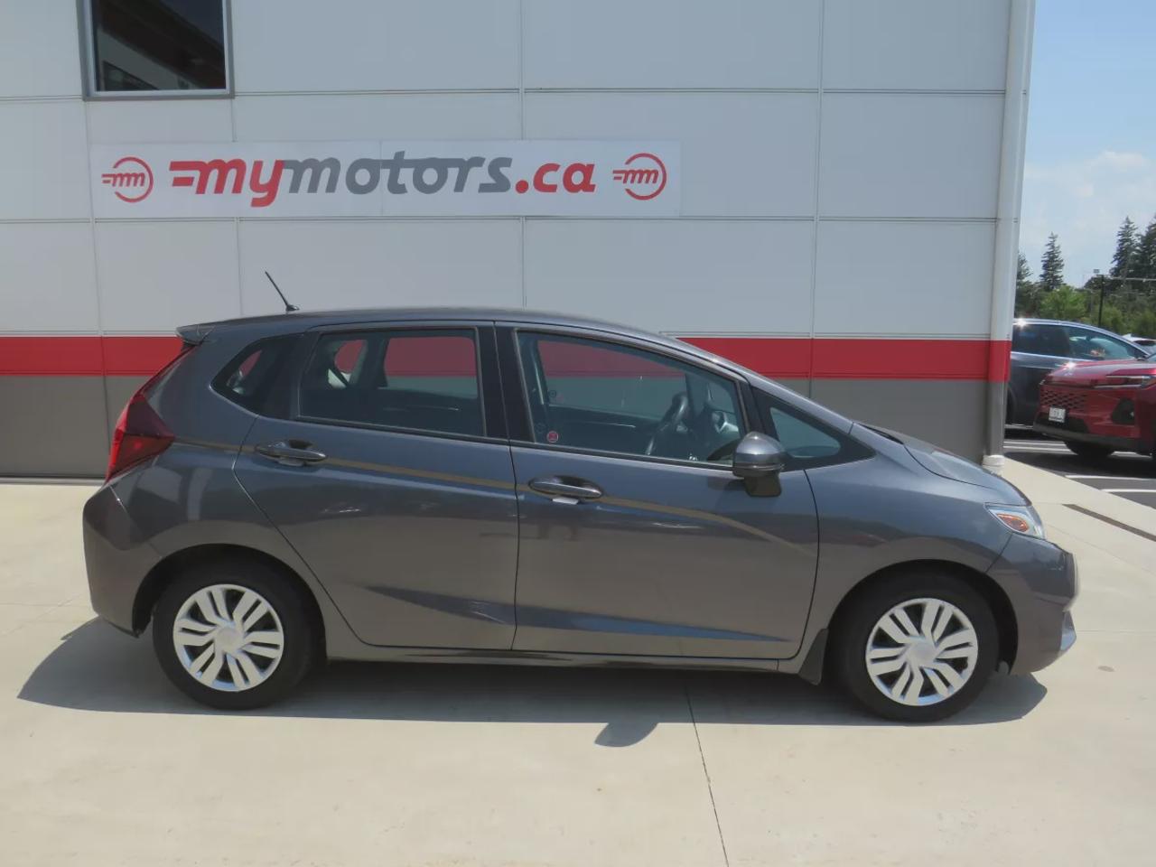 2016 Honda Fit LX | Clean Carfax | Digital Touchscreen | Reverse Camera | AC | Cruise Control | USB and HDMI| Heated Seats | Photo