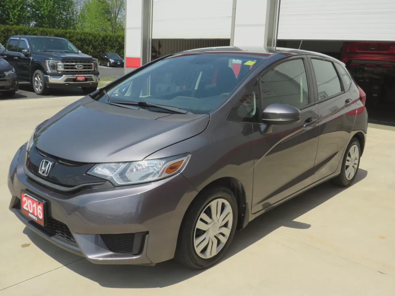 2016 Honda Fit LX | Clean Carfax | Digital Touchscreen | Reverse Camera | AC | Cruise Control | USB and HDMI| Heated Seats | Photo