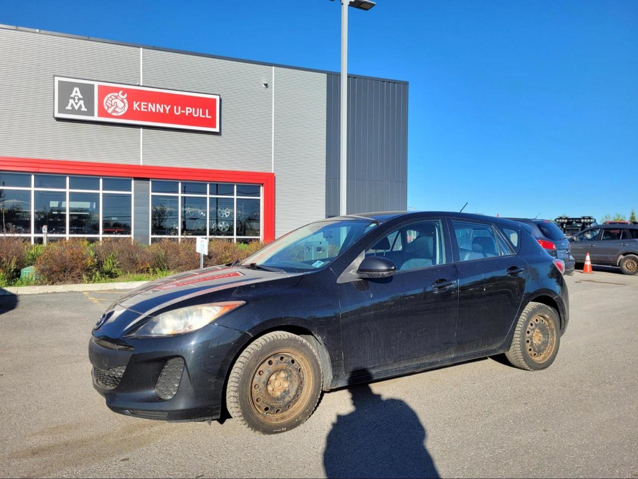 2013 Mazda 3 in Black. The vehicle has 185,524km. The vehicle runs and drives. Check engine light is on. Power steering system needs attention. Might need the wheel bearing/brake job. Few imperfections around the body. We dont perform any mechanical/safety inspections. The vehicle is sold as is and might need some work.
