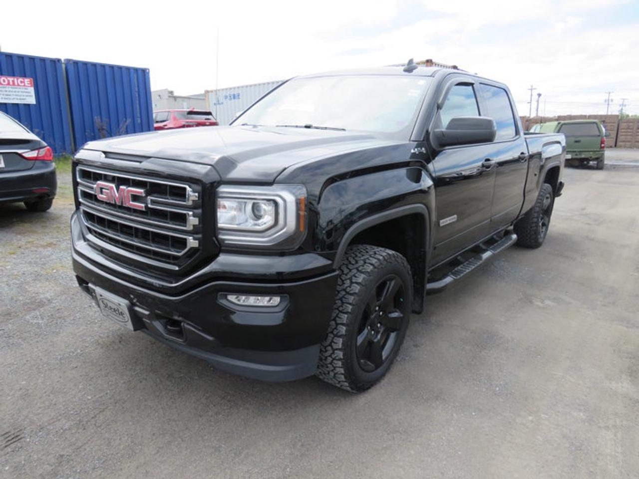 New Price!Recent Arrival!Onyx Black 2018 GMC Sierra 1500 SLE 4WD 6-Speed Automatic Electronic with Overdrive EcoTec3 5.3L V86-Speed Automatic Electronic with Overdrive, 4WD, 10-Way Power Drivers Seat Adjuster, 110-Volt AC Power Outlet, 150 Amp Alternator, 2-Speed Active Electronic AutoTrac Transfer Case, 4-Wheel Disc Brakes, 4.2 Diagonal Colour Display Driver Info Centre, 40/20/40 Front Split Bench Seat, 6 Speakers, 6-Speaker Audio System, 720 CCA/80 Amp-hr Maintenance Free HD Battery, ABS brakes, Air Conditioning, Alloy wheels, AM/FM radio: SiriusXM, Auxiliary External Transmission Oil Cooler, Body Colour Bodyside Mouldings, Body Colour Door Handles, Body Colour Grille Surround, Body Colour Pwr Adjustable Heated Outside Mirrors, Body Colour Rear Bumper w/Cornersteps, Body-Colour Lower Front Bumper, Body-Colour Mirror Caps, Brake assist, Bumpers: chrome, CD player, Cloth Seat Trim, Colour-Keyed Carpeting, Compass, Deep-Tinted Glass, Delay-off headlights, Driver & Front Passenger Illuminated Vanity Mirrors, Driver door bin, Driver vanity mirror, Dual front impact airbags, Dual front side impact airbags, Dual-Zone Automatic Climate Control, Electric Rear-Window Defogger, Electronic Stability Control, Elevation Edition, Emergency communication system: OnStar and GMC connected services capable, Exterior Parking Camera Rear, EZ Lift & Lower Tailgate, Floor Mounted Console, Front anti-roll bar, Front Frame-Mounted Black Recovery Hooks, Front License Plate Kit BC/MB/NB/ON/NL, Front Power Reclining Bucket Seats, Front reading lights, Front wheel independent suspension, Fully automatic headlights, GMC 4G LTE, GMC Connected Access, HD Radio, Heated door mirrors, Heated Driver & Front Passenger Seats, Heavy Duty Suspension, Heavy-Duty Rear Locking Differential, High-Intensity Discharge Headlights, Illuminated entry, Integrated Trailer Brake Controller, Kodiak, Leather Wrapped Steering Wheel w/Cruise Controls, LED Cargo Box Lighting, Low tire pressure warning, Manual Tilt/Telescoping Steering Column, Occupant sensing airbag, OnStar & GMC Connected Services Capable, Outside temperature display, Overhead airbag, Overhead console, Panic alarm, Passenger door bin, Passenger vanity mirror, Power door mirrors, Power steering, Power windows, Power Windows w/Driver Express Up & Down, Preferred Equipment Group 3SA, Premium audio system: GMC Infotainment System, Radio data system, Radio: AM/FM/GMC Infotainment System, Rear 60/40 Folding Bench Seat (Folds Up), Rear reading lights, Rear step bumper, Rear Wheelhouse Liners, Remote Keyless Entry, Remote keyless entry, Remote Locking Tailgate, Remote Vehicle Starter System, Rubberized-Vinyl Front Floor Mats, Rubberized-Vinyl Rear Floor Mats, Single Slot CD/MP3 Player, Single-Zone Air Conditioning, SiriusXM, Speed control, Speed-sensing steering, Split folding rear seat, Spray-On Pickup Box Bed Liner, Steering Wheel Audio Controls, Steering wheel mounted audio controls, Tachometer, Theft Deterrent System (Unauthorized Entry), Thin Profile LED Fog Lamps, Tilt steering wheel, Traction control, Trailering Equipment, Trip computer, Universal Home Remote, Variably intermittent wipers, Voltmeter, Wheels: 17 x 8 Bright Machined Aluminum, Wheels: 20 x 9 Black-Painted Aluminum, Wireless Charging.Certification Program Details: 2 Years Fresh MVI Fully Detailed Full Tank of fuel Brale Through InspectionAt Steele GMC Buick Fredericton, were proud to be your Used Car Mega Center serving drivers all across Atlantic Canada from Fredericton, Oromocto, New Maryland, Woodstock, Saint John, and Moncton in New Brunswick, to Nova Scotia, Prince Edward Island, and Newfoundland. Our inventory features all makes and models of used cars, trucks, SUVs, and vans, giving you the best selection in the region. Whether you need a fuel-efficient sedan, a family SUV, or a rugged pickup, youll find it right here at Steele GMC Buick Fredericton. With our Market Value Pricing, every ve