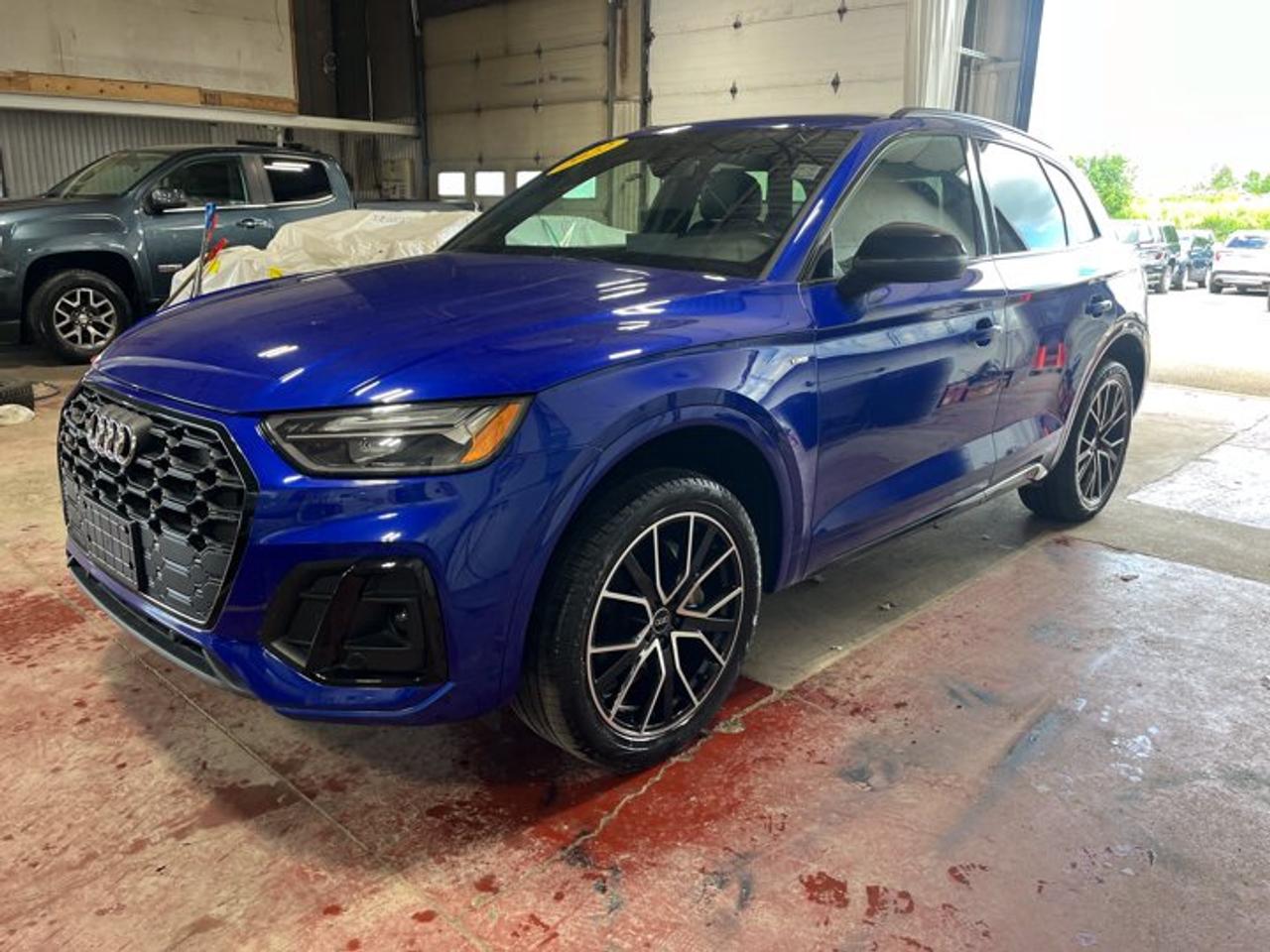 New Price!CARFAX Canada One OwnerCARFAX Canada No Reported AccidentsNavarra Blue Metallic 2022 Audi Q5 45 Progressiv quattro quattro 7-Speed Automatic S tronic 2.0L 4-Cylinder TFSIBlack Leather, 10 Speakers, 4-Wheel Disc Brakes, 5.302 Axle Ratio, ABS brakes, Air Conditioning, Alloy wheels, AM/FM radio: SiriusXM, Auto High-beam Headlights, Auto-dimming door mirrors, Auto-dimming Rear-View mirror, Automatic temperature control, Brake assist, Compass, Delay-off headlights, Driver door bin, Driver vanity mirror, Dual front impact airbags, Dual front side impact airbags, Electronic Stability Control, Emergency communication system: Audi connect Security and Assistance, Exterior Parking Camera Rear, Four wheel independent suspension, Front anti-roll bar, Front Bucket Seats, Front dual zone A/C, Front fog lights, Front reading lights, Garage door transmitter: HomeLink, Heated door mirrors, Heated Front Bucket Seats, Heated front seats, Heated steering wheel, Illuminated entry, Leather Seating Surfaces, Leather Shift Knob, Leather steering wheel, Low tire pressure warning, Memory seat, Navigation system: MMI Navigation plus, Occupant sensing airbag, Outside temperature display, Overhead airbag, Overhead console, Panic alarm, Passenger door bin, Passenger vanity mirror, Power door mirrors, Power driver seat, Power Liftgate, Power moonroof, Power passenger seat, Power steering, Power windows, Radio data system, Radio: MMI Navigation Plus w/SiriusXM Satellite, Rain sensing wipers, Rear air conditioning, Rear anti-roll bar, Rear fog lights, Rear reading lights, Rear window defroster, Rear window wiper, Remote keyless entry, Roof rack, Security system, Speed control, Speed-sensing steering, Speed-Sensitive Wipers, Split folding rear seat, Spoiler, Steering wheel mounted audio controls, Tachometer, Telescoping steering wheel, Tilt steering wheel, Traction control, Trip computer, Turn signal indicator mirrors, Variably intermittent wipers, Wheels: 8.0J x 19 5-Twin-Arm Design.Certification Program Details: 80 Point Inspection Fresh Oil Change Full Vehicle Detail Full tank of Gas 2 Years Fresh MVI Brake through InspectionAt Steele GMC Buick Fredericton, were proud to be your Used Car Mega Center serving drivers all across Atlantic Canada from Fredericton, Oromocto, New Maryland, Woodstock, Saint John, and Moncton in New Brunswick, to Nova Scotia, Prince Edward Island, and Newfoundland. Our inventory features all makes and models of used cars, trucks, SUVs, and vans, giving you the best selection in the region. Whether you need a fuel-efficient sedan, a family SUV, or a rugged pickup, youll find it right here at Steele GMC Buick Fredericton. With our Market Value Pricing, every vehicle is priced based on real-time market conditions, ensuring you get the best possible deal without the hassle of negotiating. We keep pricing transparent and competitive so you can shop with total confidence. No matter your credit situation good, bad, or no credit at all youre approved. Our finance experts work with lenders across Atlantic Canada to find the best terms for your budget, including second-chance financing, newcomer programs, and credit rebuilding solutions. As part of Steele Auto Group, Atlantic Canadas most diversified automotive group with 47 dealerships representing 27 brands, we offer unmatched selection, buying power, and customer support. That means if the vehicle you want isnt on our Fredericton lot, we can source it quickly from our massive dealer network across the Maritimes. When it comes to used vehicles, Steele GMC Buick Fredericton is the destination for drivers all across Atlantic Canada delivering market value pricing, every make and model, and guaranteed credit approval so you can get on the road with confidence.Steele Auto Group is the most diversified group of automobile dealerships in Atlantic Canada, with 47 dealerships selling 27 brands and