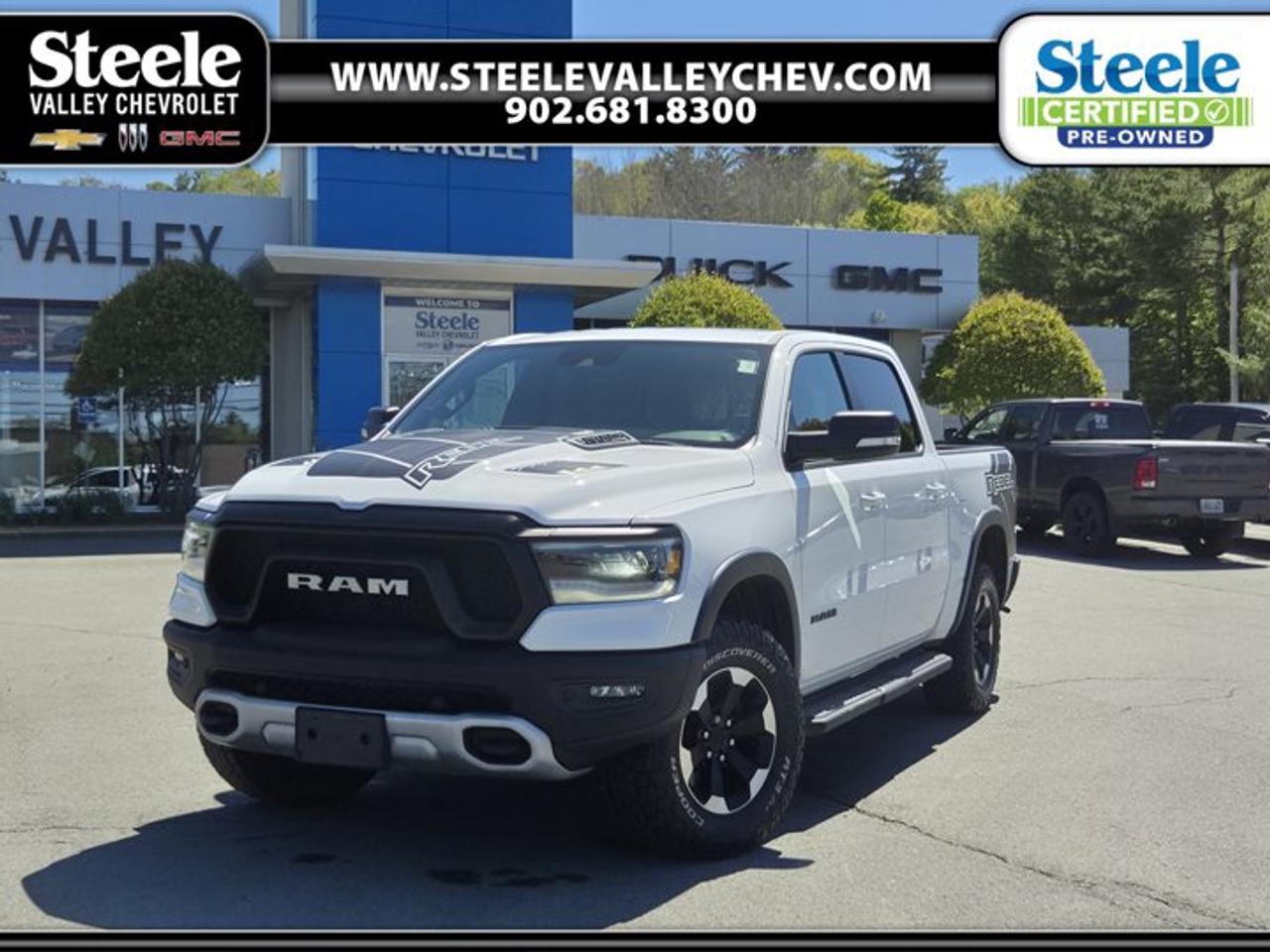 This 2022 Ram 1500 Rebel 4WD with 92,000 km, finished in Bright White with a Red/Black interior, has completed a Steele Auto Group 85-point inspection, including a full mechanical inspection, brake and tire measurements, and professional interior and exterior detailing. The vehicle has also received a fresh oil change and filters and has been road tested by a certified technician.Key Features:5.7L HEMI V8 performanceApple CarPlay and Android Auto integrationOff-road suspension with Rebel styling packageHeated front seats and heated steering wheelRemote start systemRear vision cameraPositioned as a bold, off-road-capable full-size pickup, the 2022 Ram 1500 Rebel 4WD combines V8 power with factory off-road hardware and modern connectivity, making it a strong option for buyers comparing capable trucks with added comfort and utility. This one-owner, SAG inspected example presents as a well-prepared unit with documented inspection and maintenance. We invite you to book a viewing and test drive at your convenience.