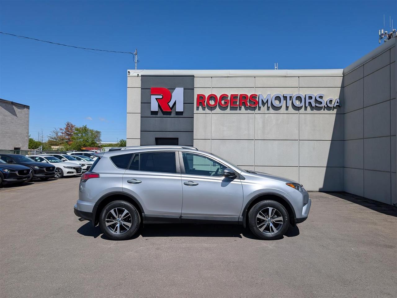 2018 Toyota RAV4 LE - HTD SEATS - REV CAM - TECH FEATS Photo